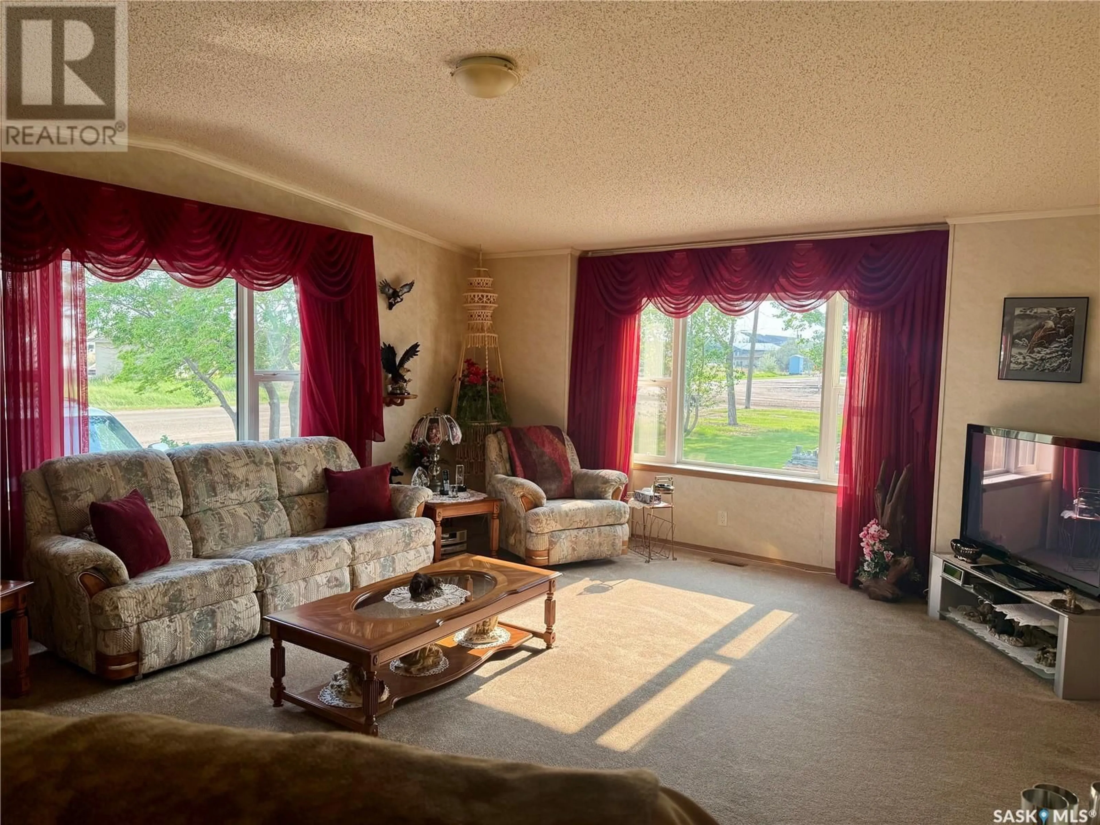 Living room with furniture, unknown for 313 FIRST STREET, North Portal Saskatchewan S0C1W0