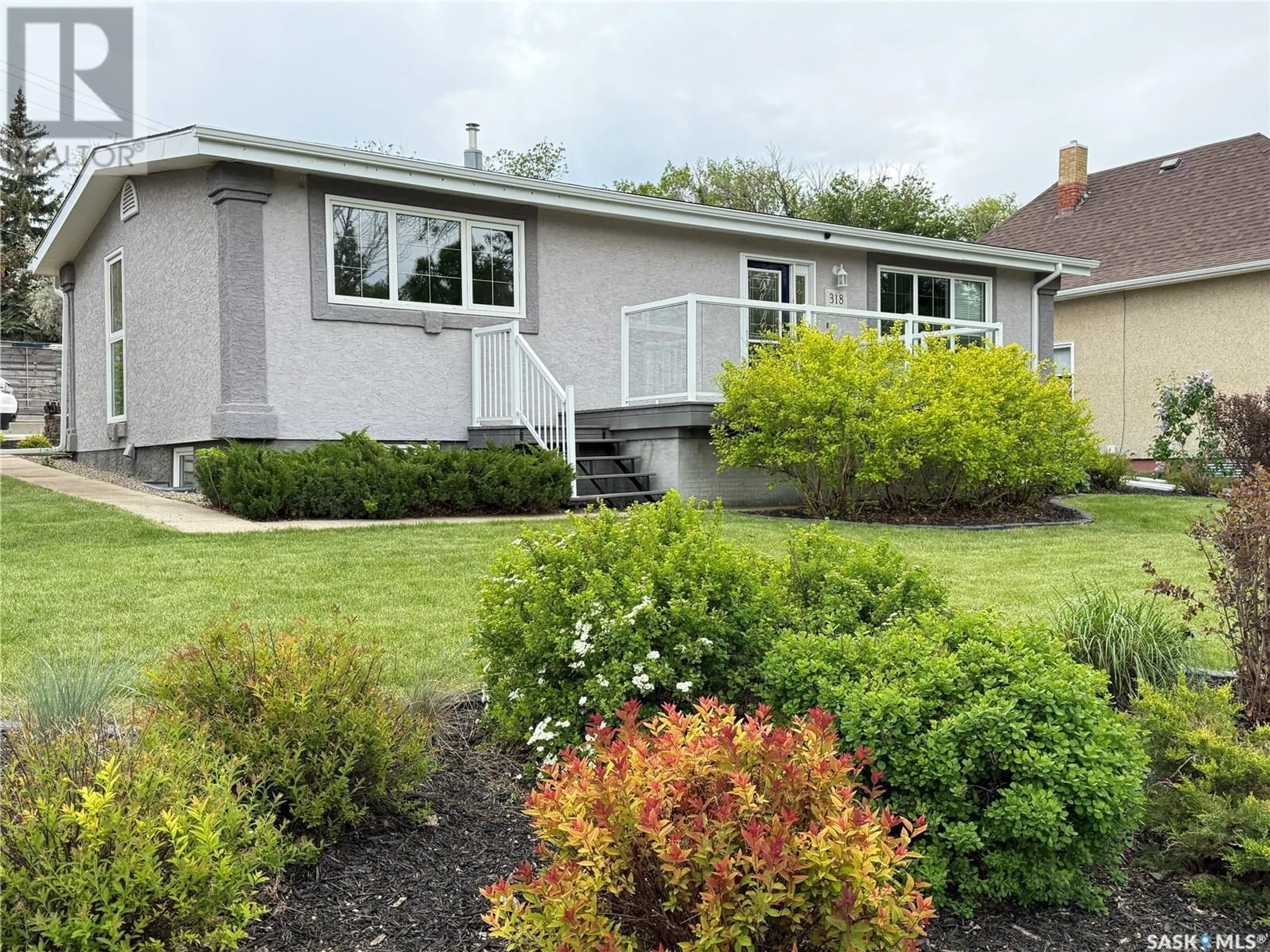 A pic from outside/outdoor area/front of a property/back of a property/a pic from drone, street for 318 CONFEDERATION DRIVE, Weyburn Saskatchewan S4H2G8