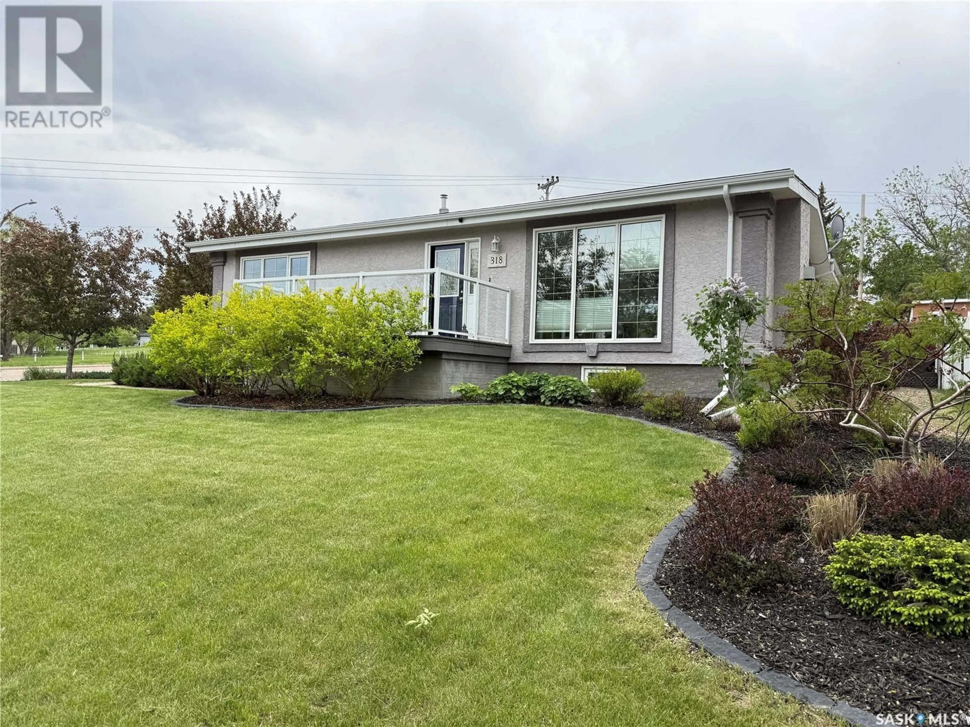 Home with vinyl exterior material, unknown for 318 CONFEDERATION DRIVE, Weyburn Saskatchewan S4H2G8