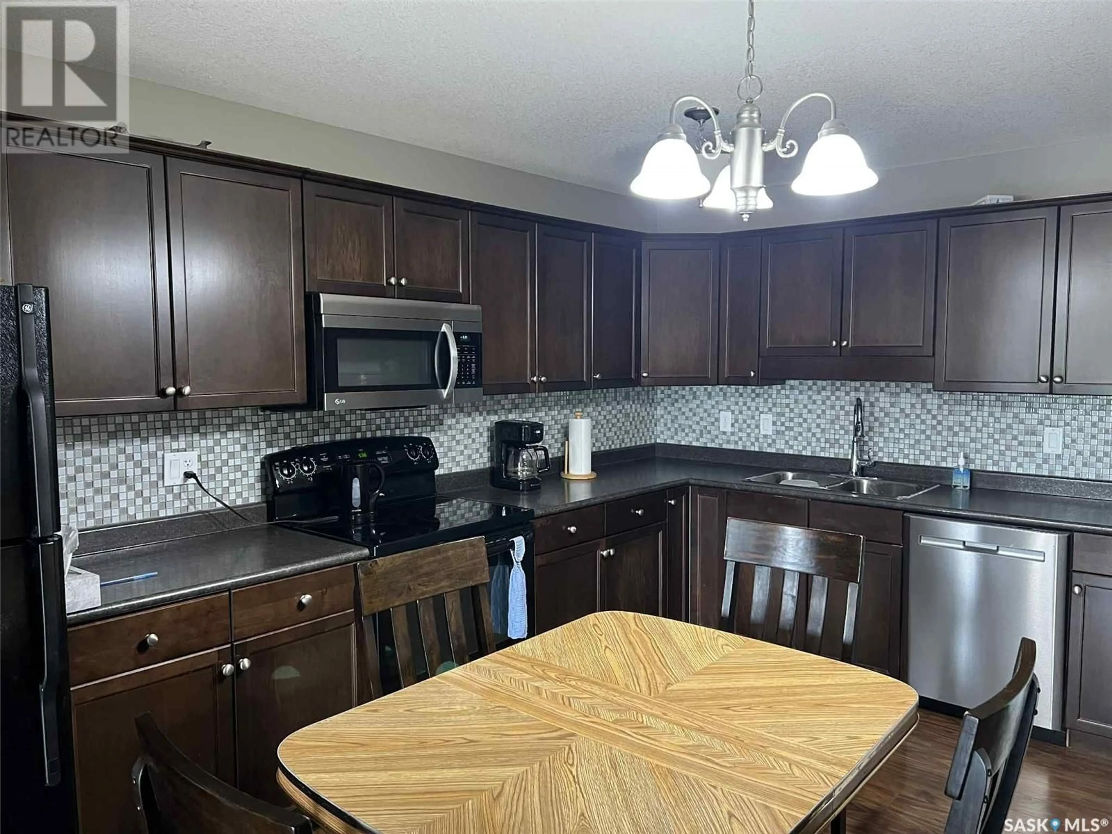 Open concept kitchen, unknown for 313E 1300 STOCKTON STREET, Regina Saskatchewan S4X0B8