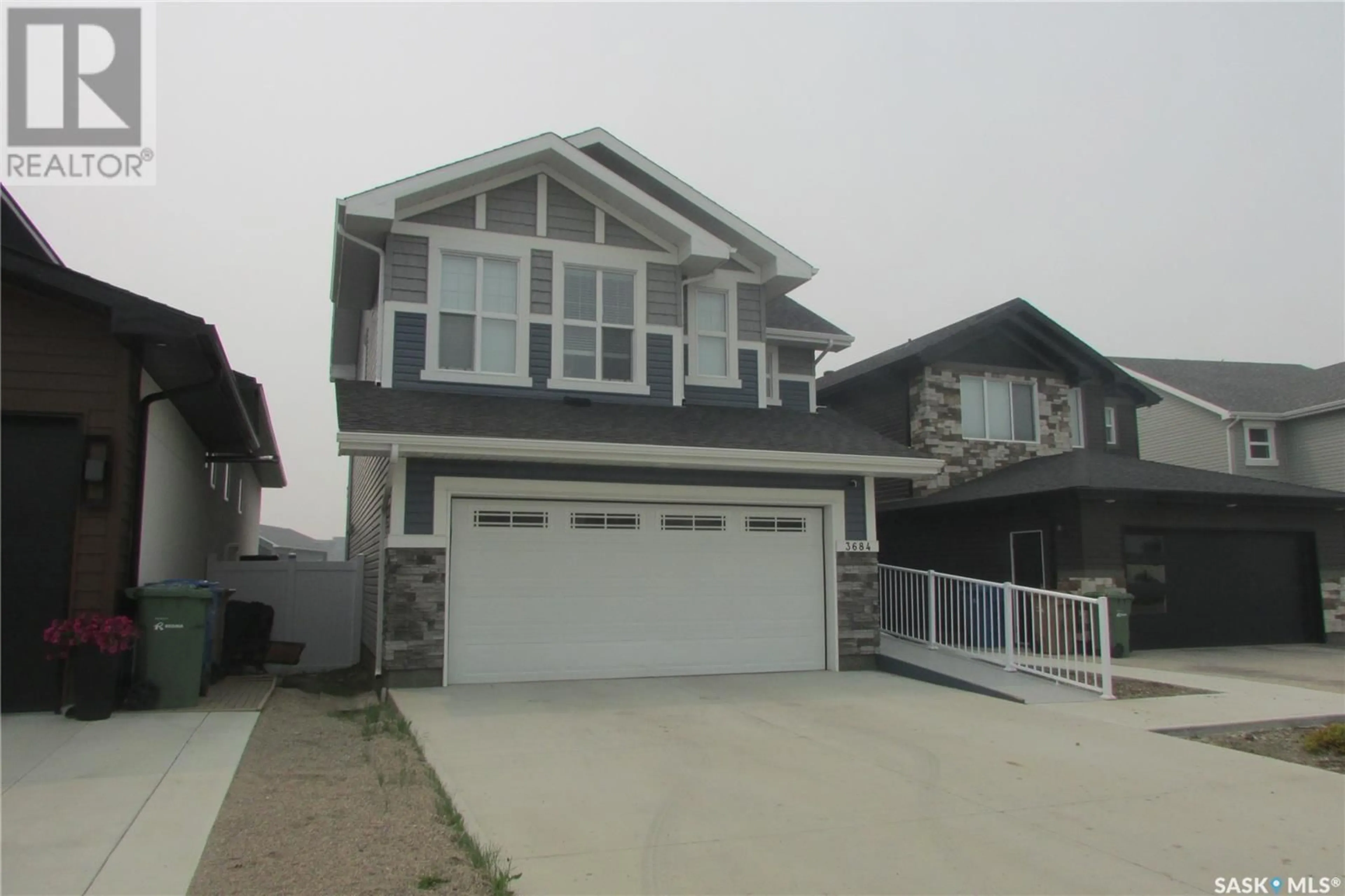 Home with vinyl exterior material, street for 3684 GEE CRESCENT, Regina Saskatchewan S4V3P2