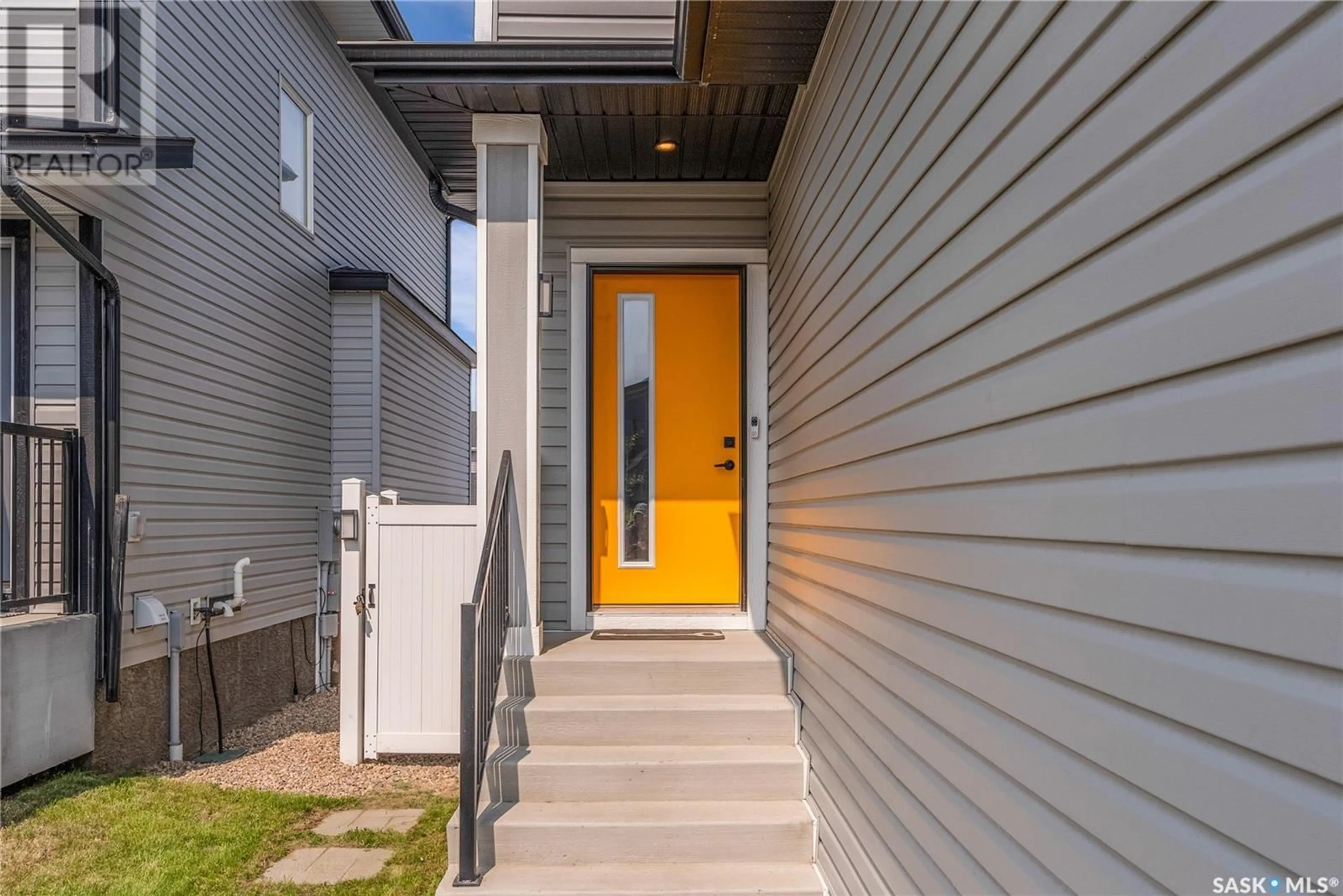 Home with vinyl exterior material, street for 163 CHELSOM BEND, Saskatoon Saskatchewan S7V0Z9