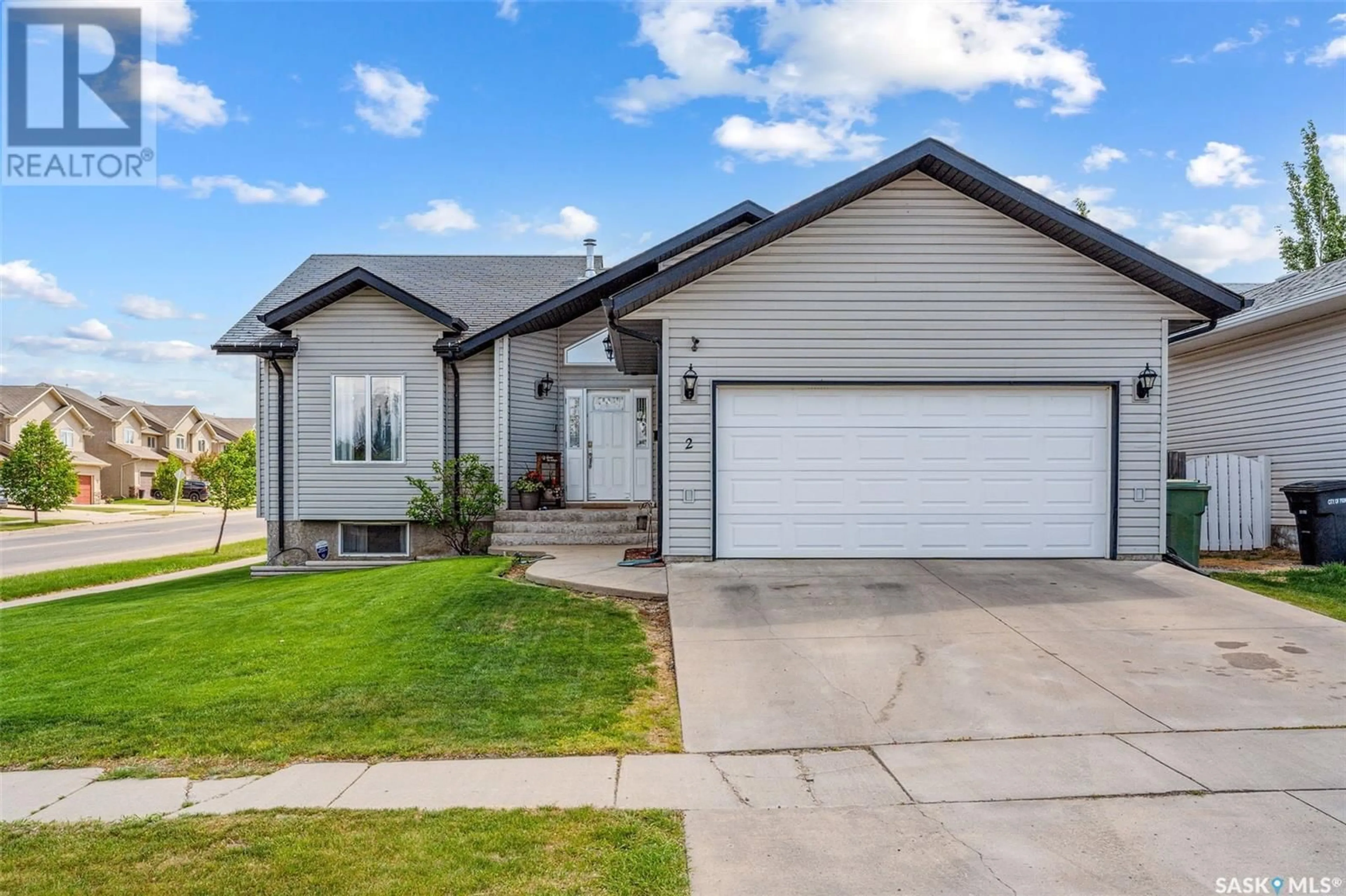 Home with vinyl exterior material, street for 2 TELFER BAY, Prince Albert Saskatchewan S6X1C4