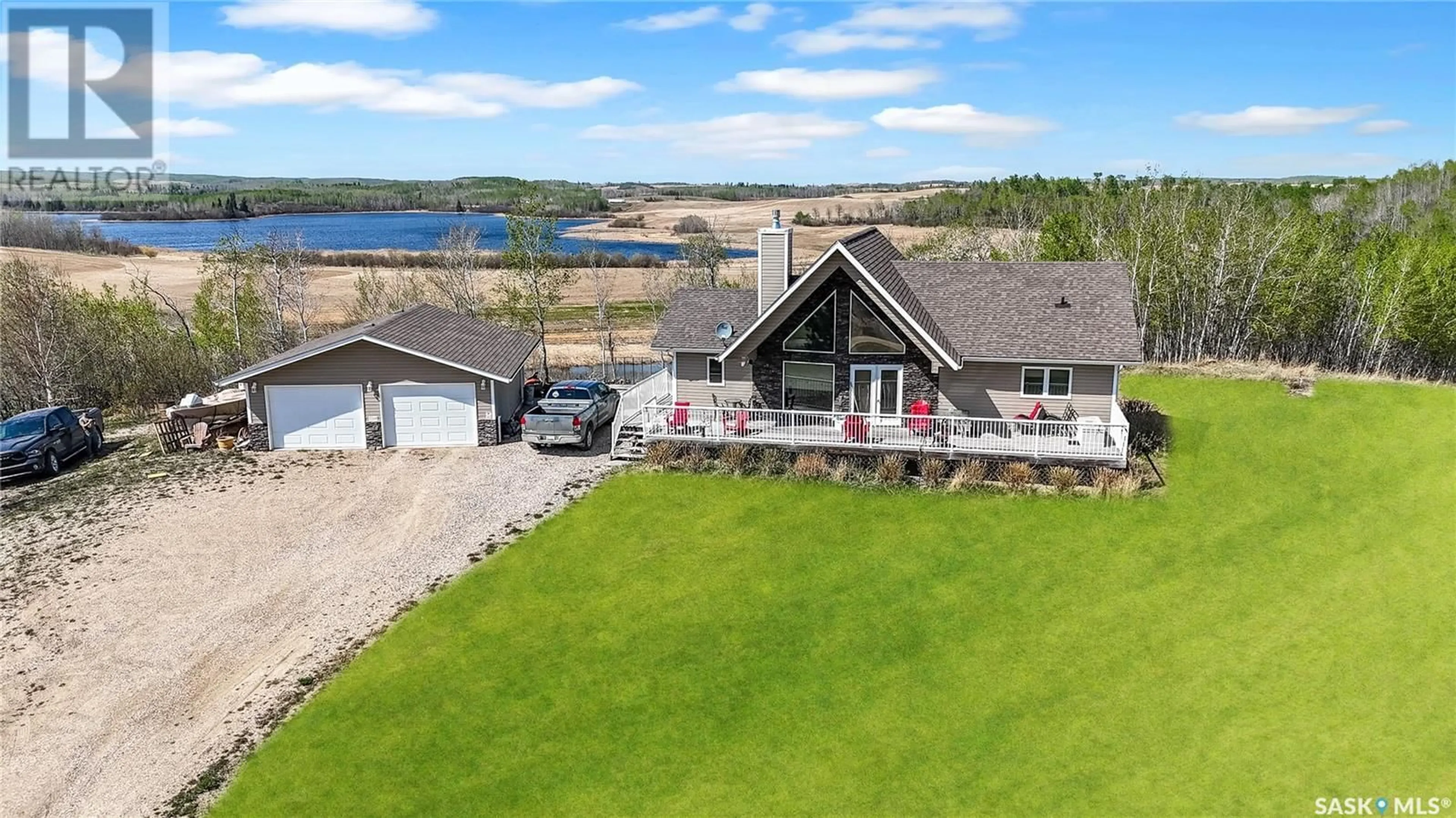 A pic from outside/outdoor area/front of a property/back of a property/a pic from drone, water/lake/river/ocean view for 35 A.J. CANTIN, Leask Rm No. 464 Saskatchewan S0J1M0