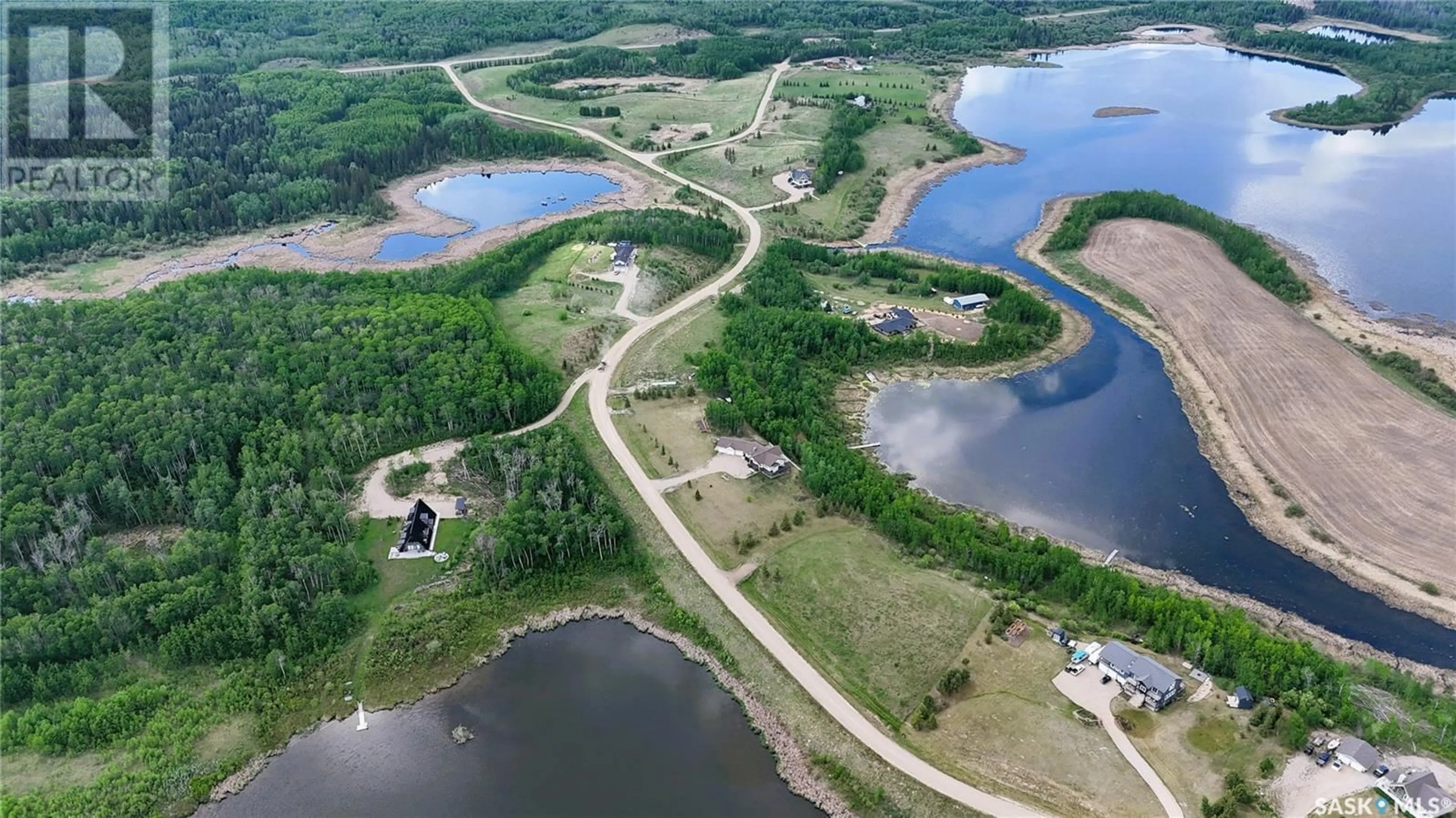 A pic from outside/outdoor area/front of a property/back of a property/a pic from drone, water/lake/river/ocean view for 35 A.J. CANTIN, Leask Rm No. 464 Saskatchewan S0J1M0