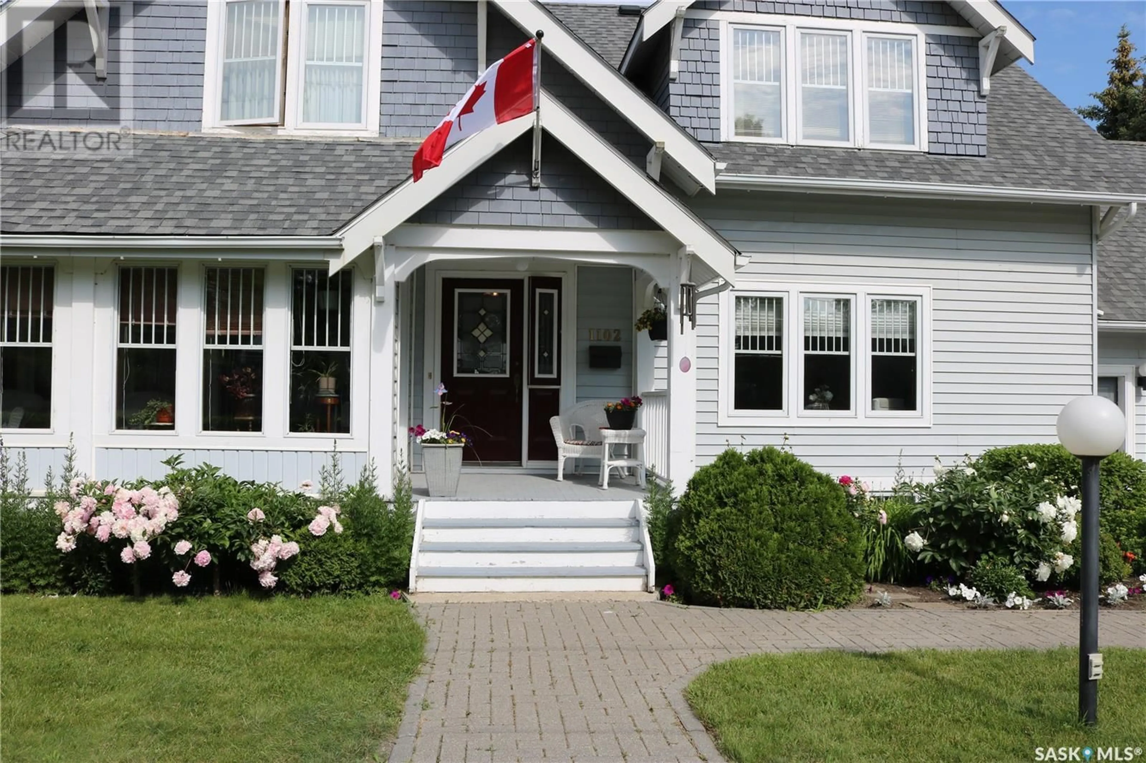 Home with vinyl exterior material, street for 1102 GORDON STREET, Moosomin Saskatchewan S0G3N0