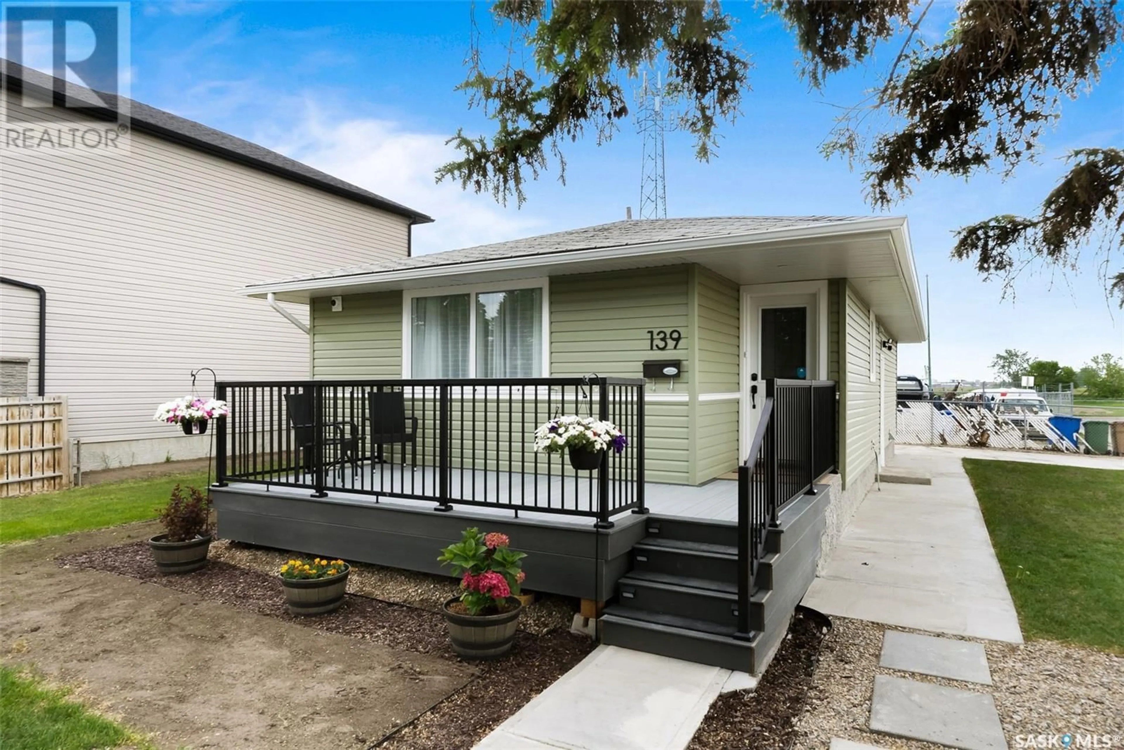Home with vinyl exterior material, street for 139 QUEBEC STREET, Regina Saskatchewan S4R2S2