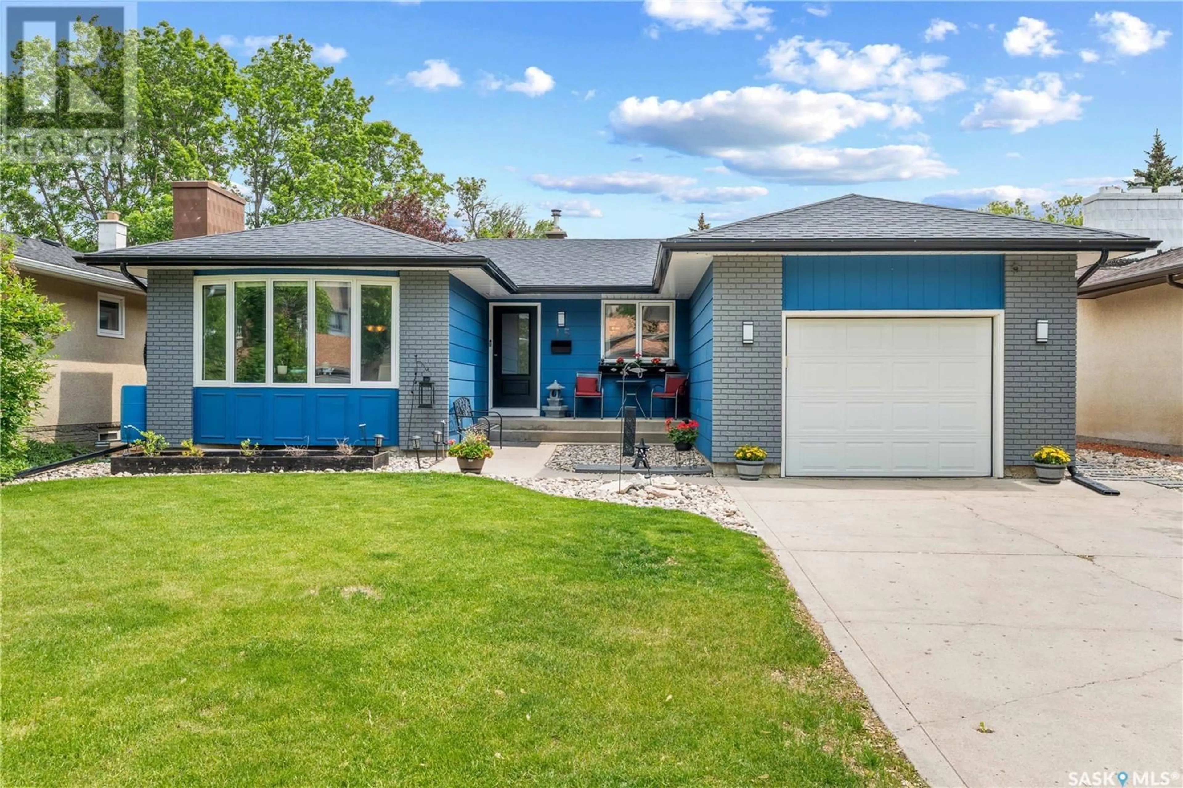 Home with brick exterior material, street for 15 WINDFIELD ROAD, Regina Saskatchewan S4V0E6