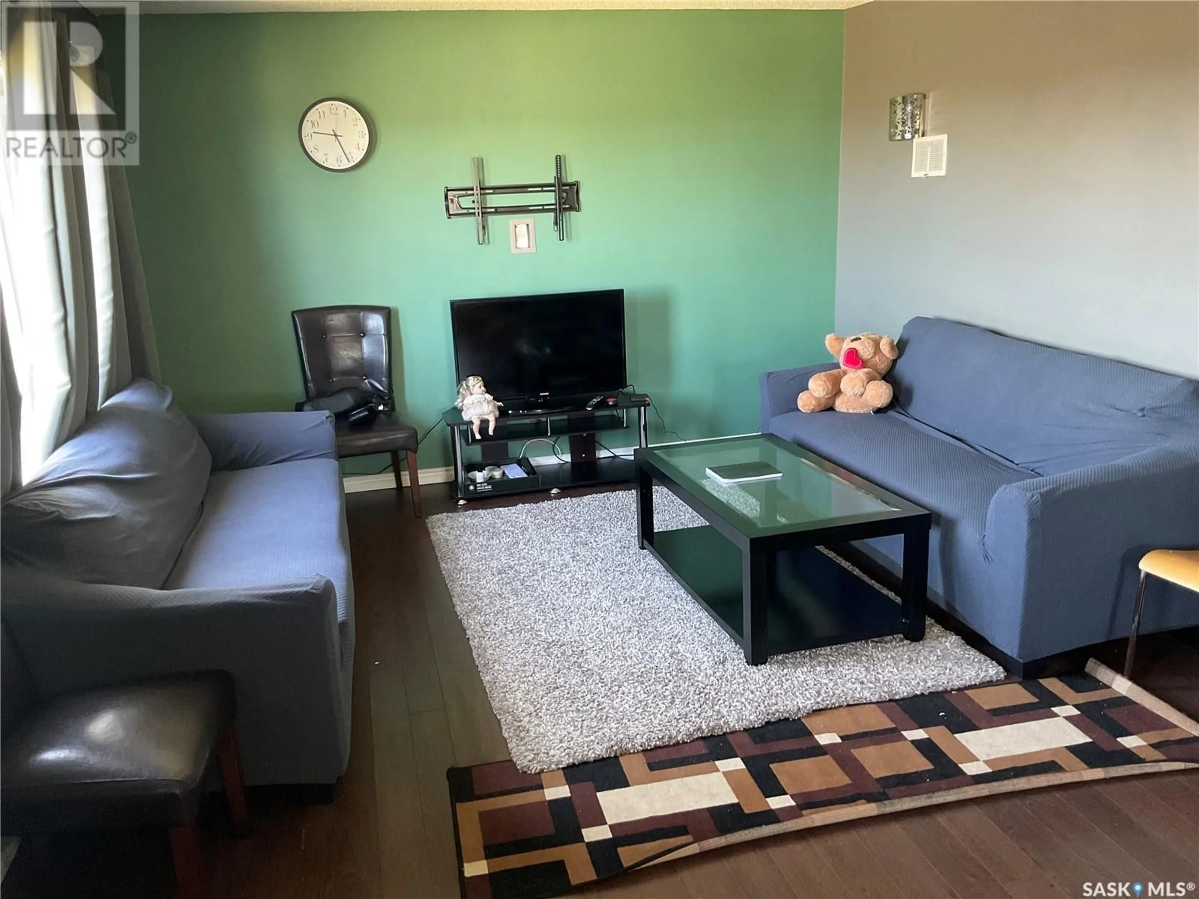 Living room with furniture, wood/laminate floor for 217 3RD STREET, Wakaw Saskatchewan S0K4P0