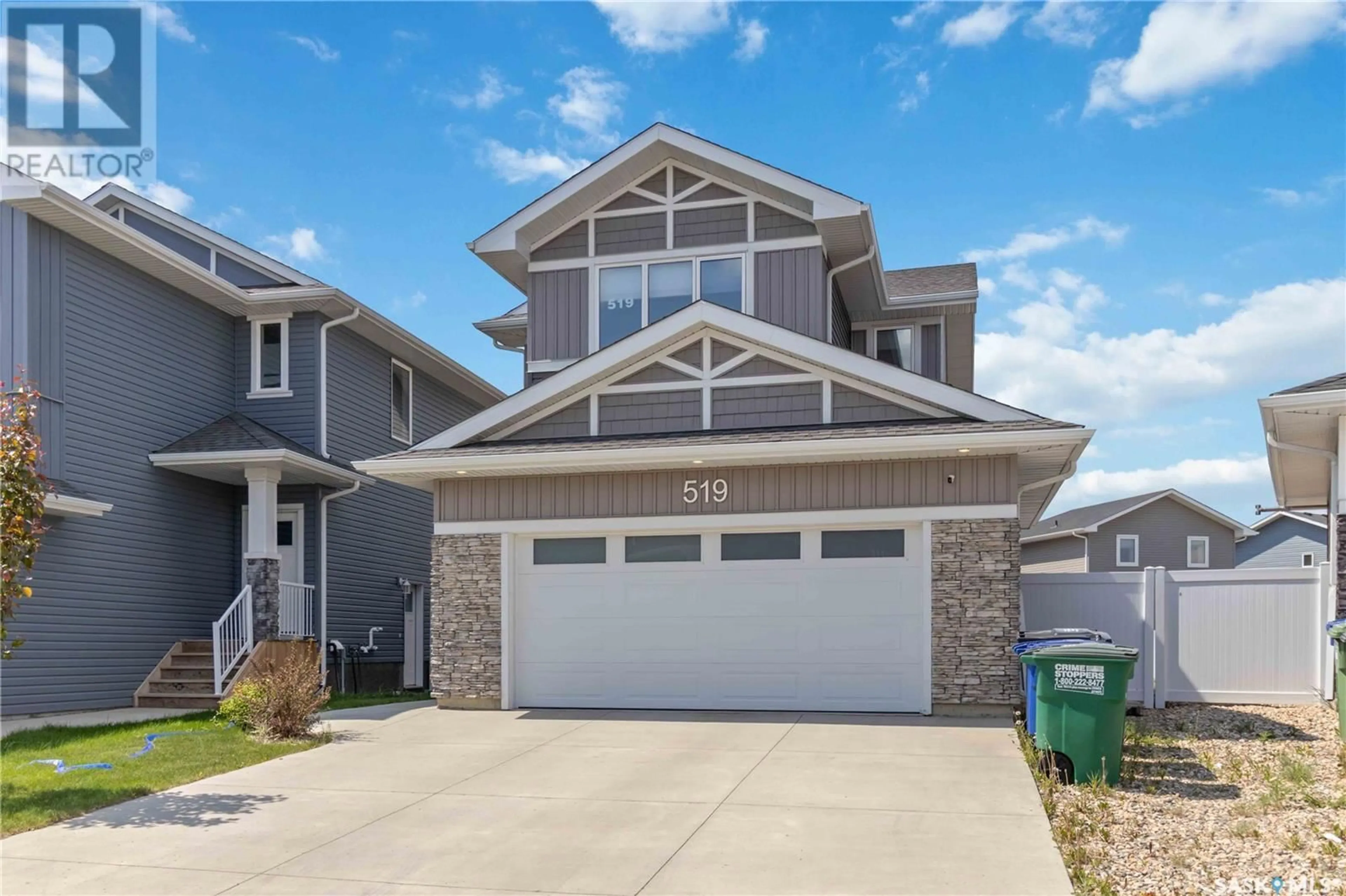 Home with vinyl exterior material, street for 519 MCFAULL CRESCENT, Saskatoon Saskatchewan S7V0T1