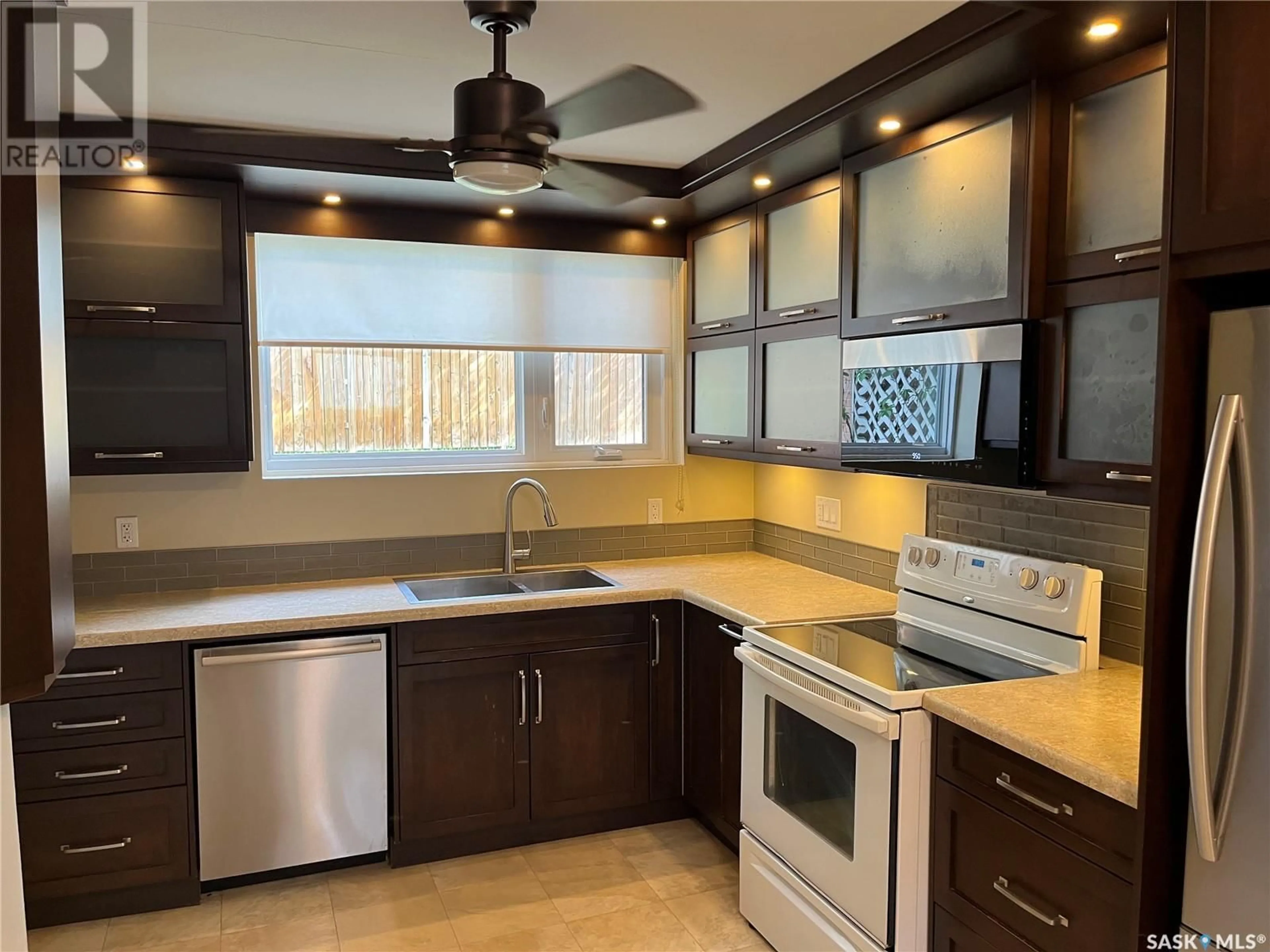 Open concept kitchen, ceramic/tile floor for 4 - 2 NEILL PLACE, Regina Saskatchewan S4N2V4