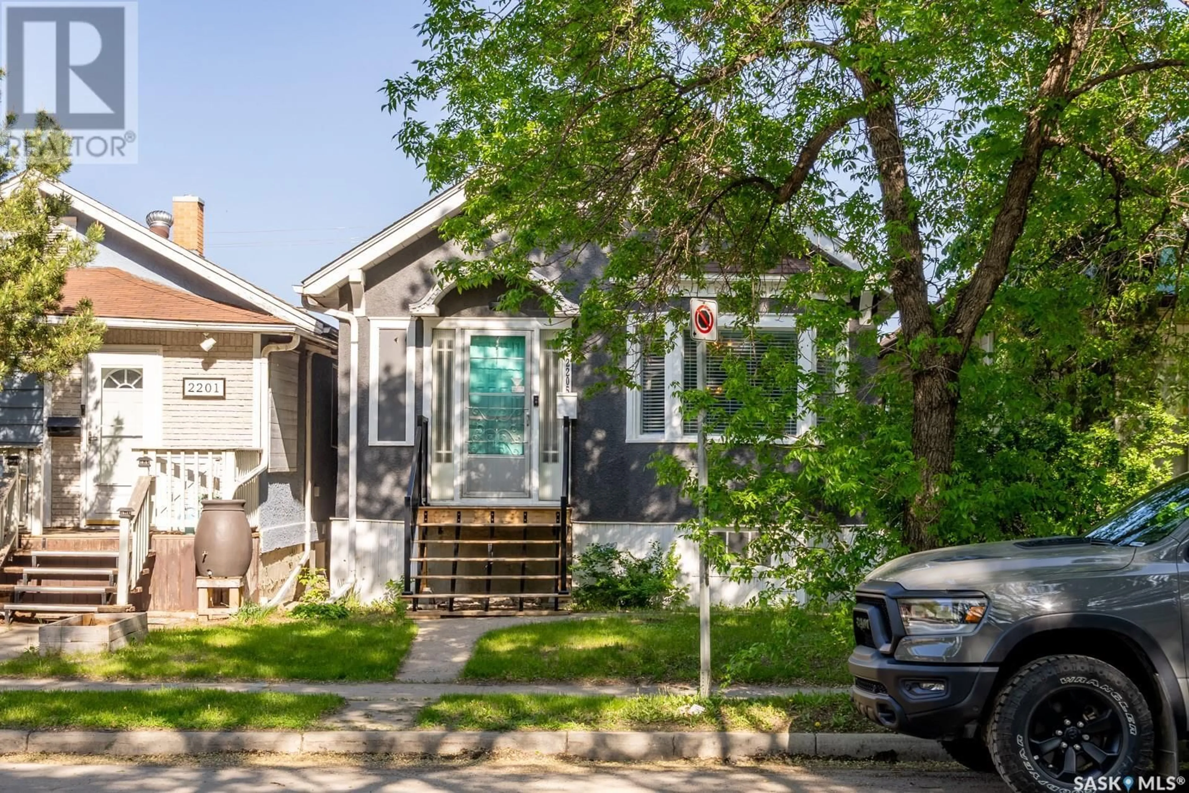 Home with vinyl exterior material, street for 2205 WINNIPEG STREET, Regina Saskatchewan S4P1H2