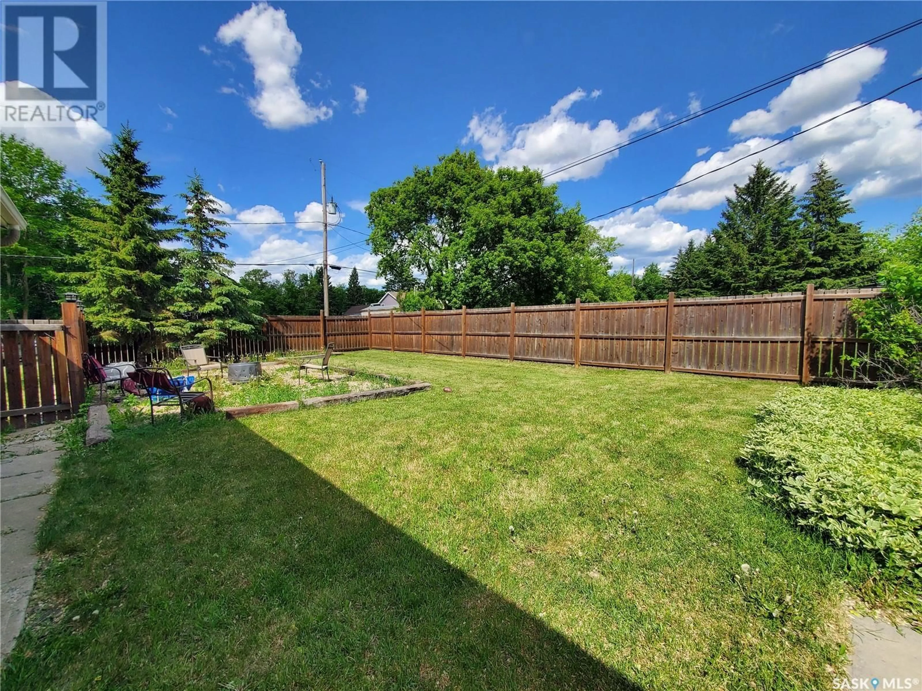 A pic from outside/outdoor area/front of a property/back of a property/a pic from drone, unknown for 327 WALLACE STREET, Kamsack Saskatchewan S0A1S0
