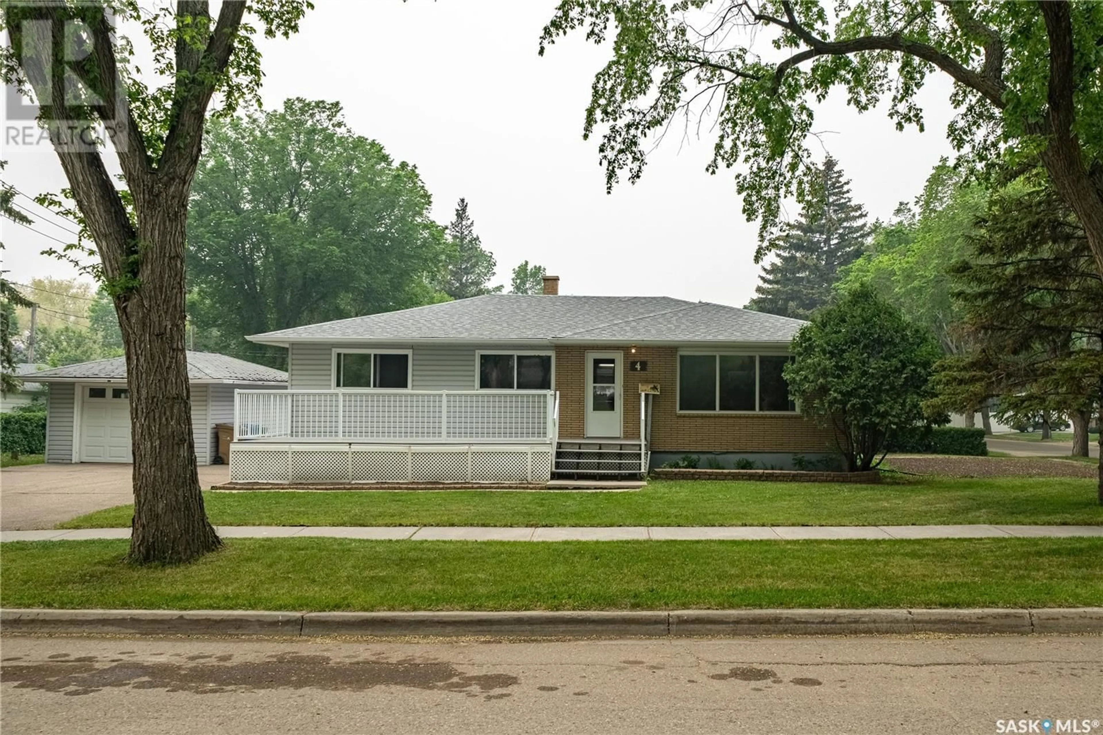 Home with vinyl exterior material, street for 4 MASSEY ROAD, Regina Saskatchewan S4S4M7
