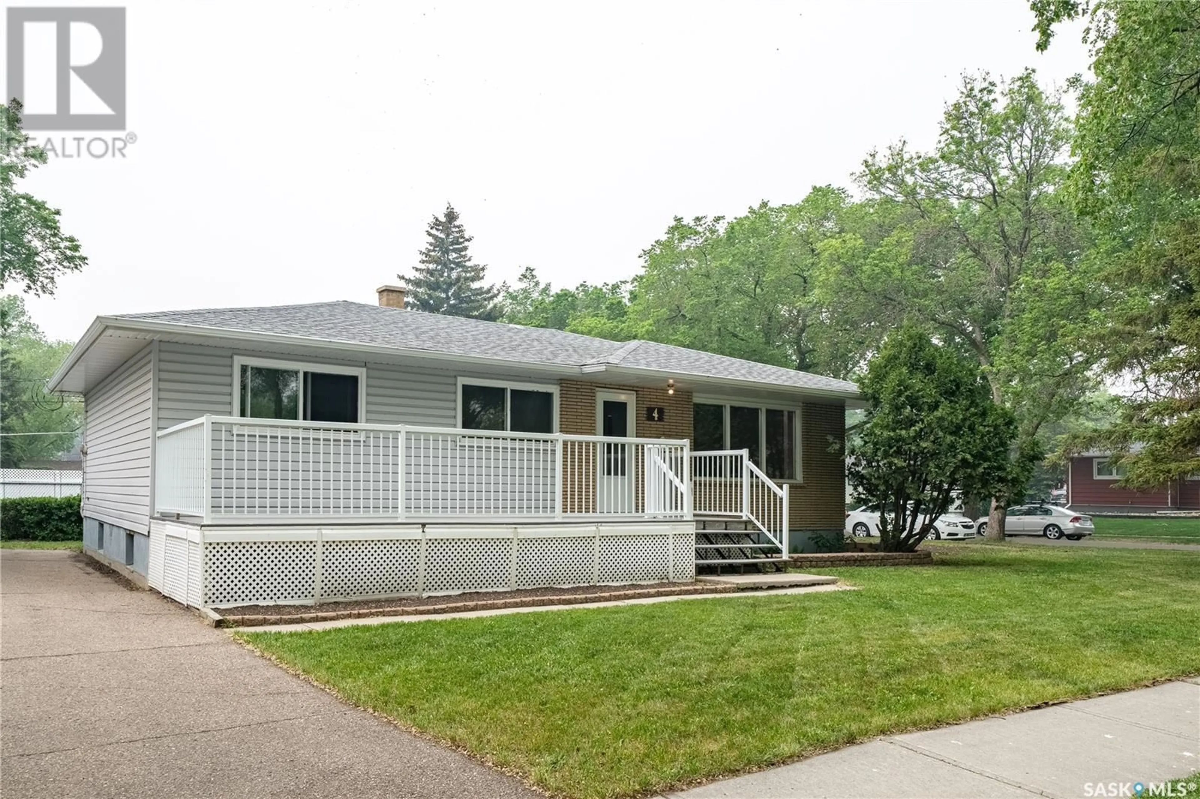 Home with vinyl exterior material, street for 4 MASSEY ROAD, Regina Saskatchewan S4S4M7