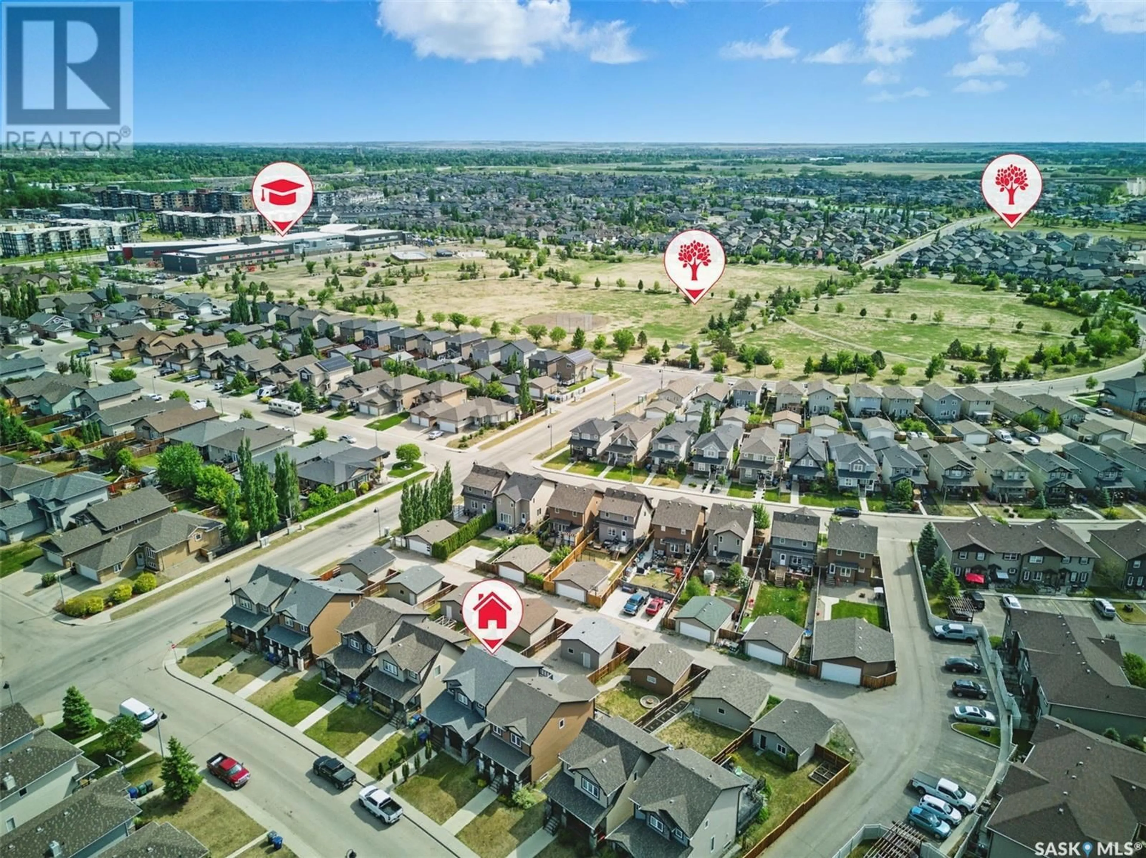 A pic from outside/outdoor area/front of a property/back of a property/a pic from drone, street for 370 LEVALLEY COVE, Saskatoon Saskatchewan S7T0H2