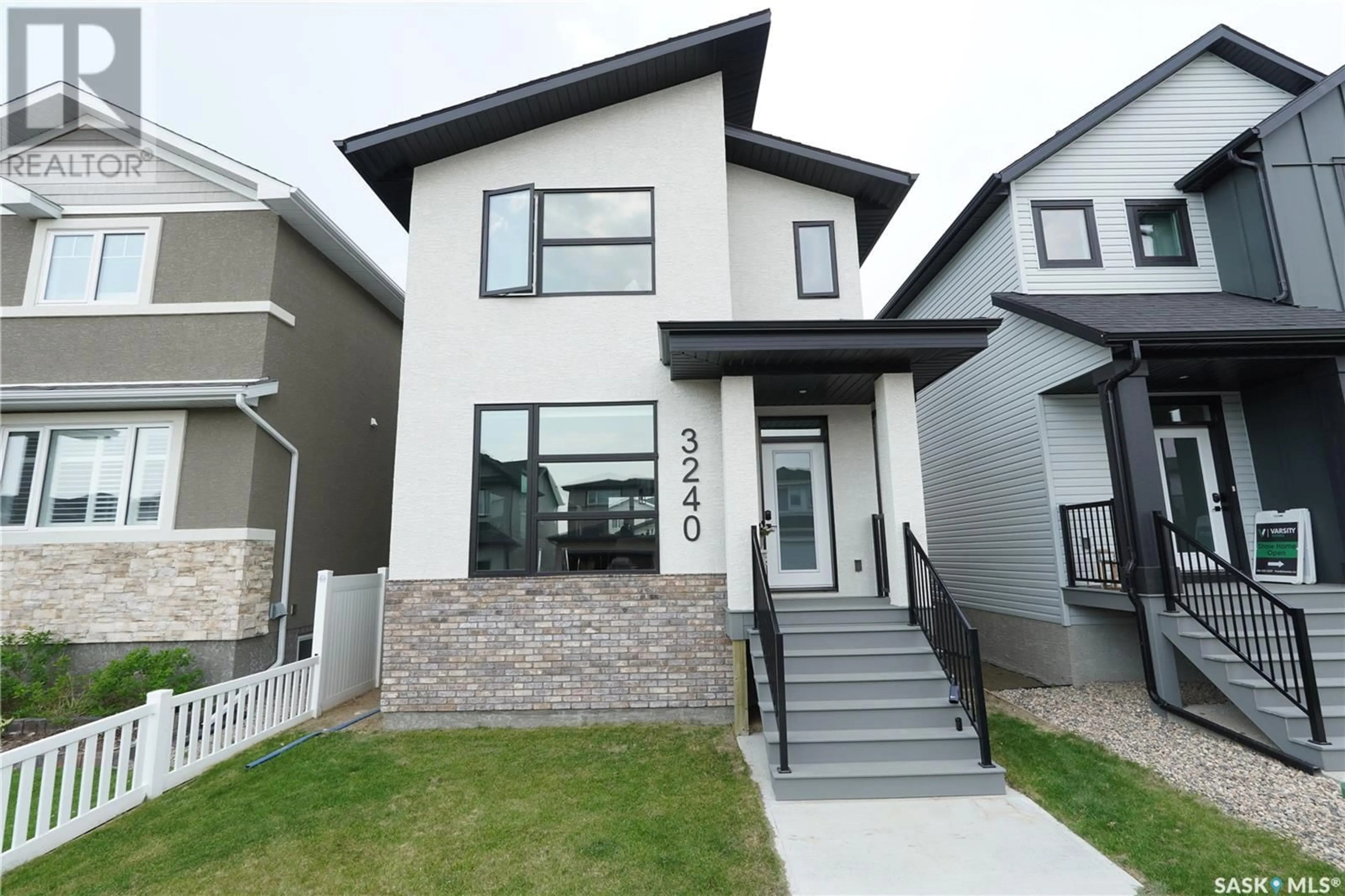 Home with vinyl exterior material, street for 3240 GREEN WATER DRIVE, Regina Saskatchewan S4V3R5