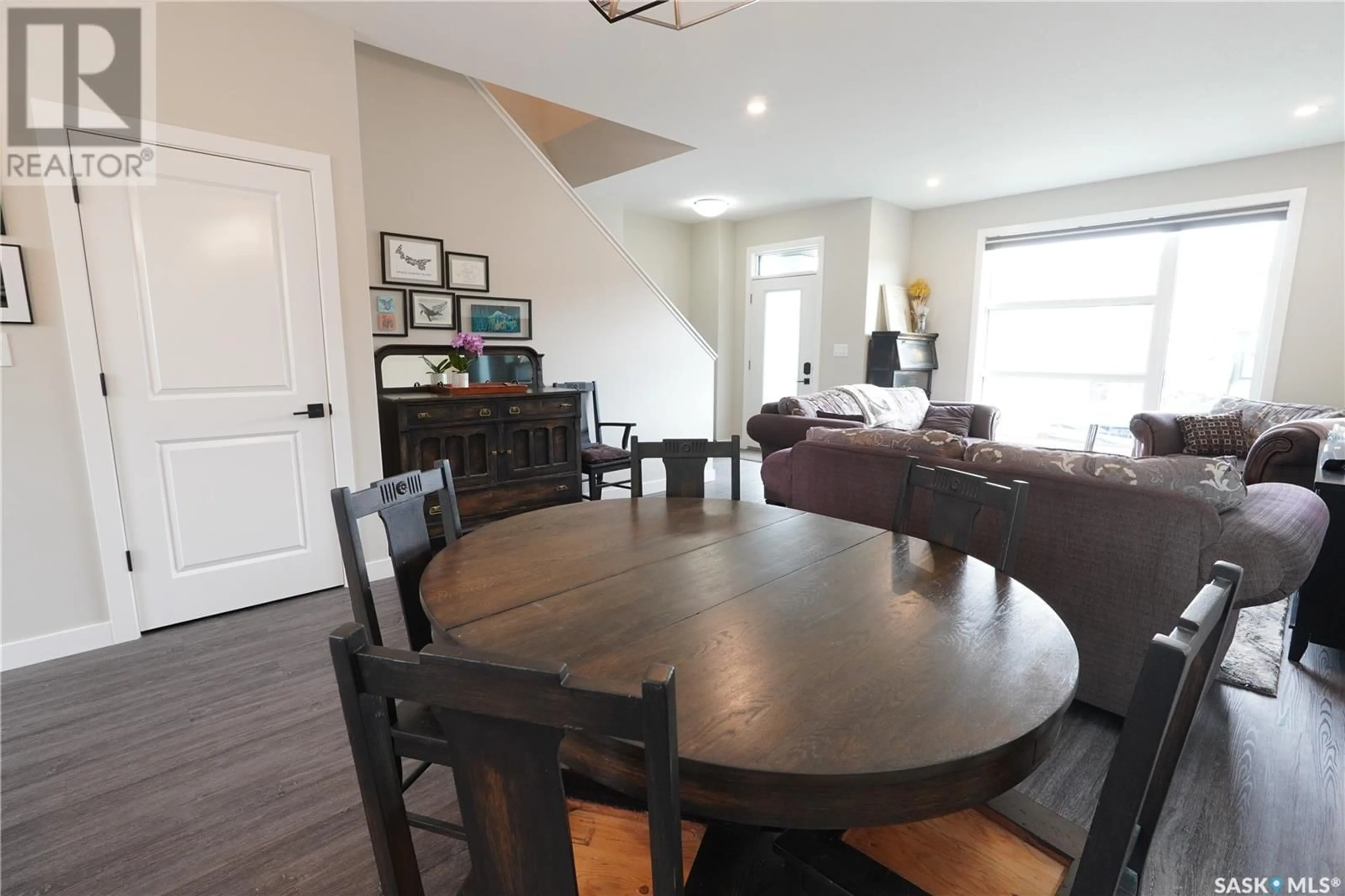 Dining room, wood/laminate floor for 3240 GREEN WATER DRIVE, Regina Saskatchewan S4V3R5