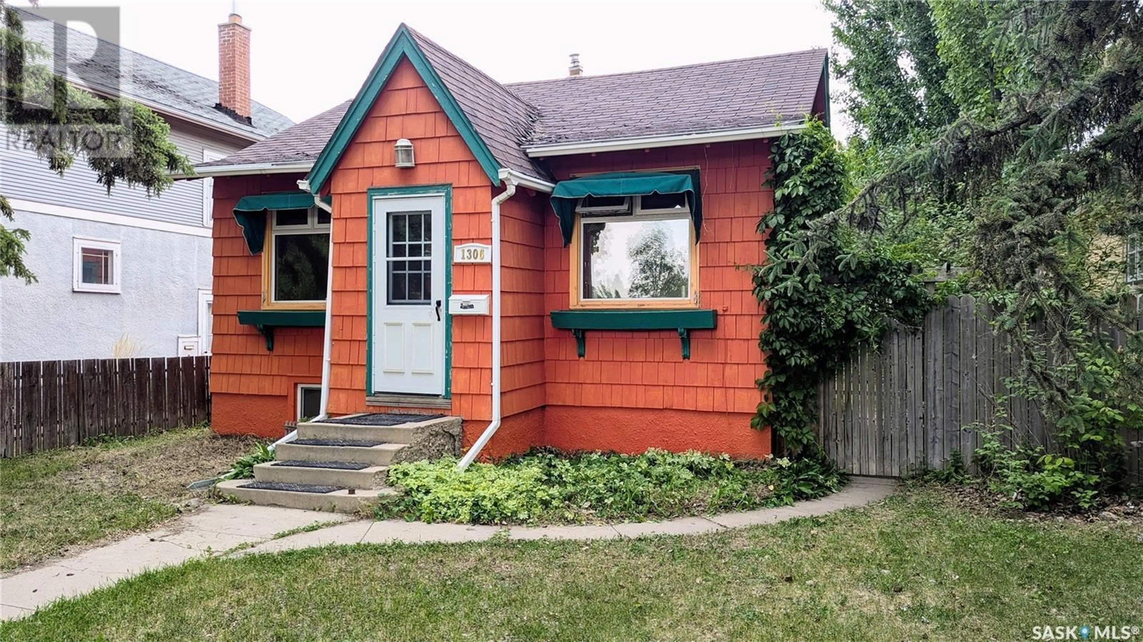 Home with brick exterior material, street for 1306 E AVENUE N, Saskatoon Saskatchewan S7L1T5