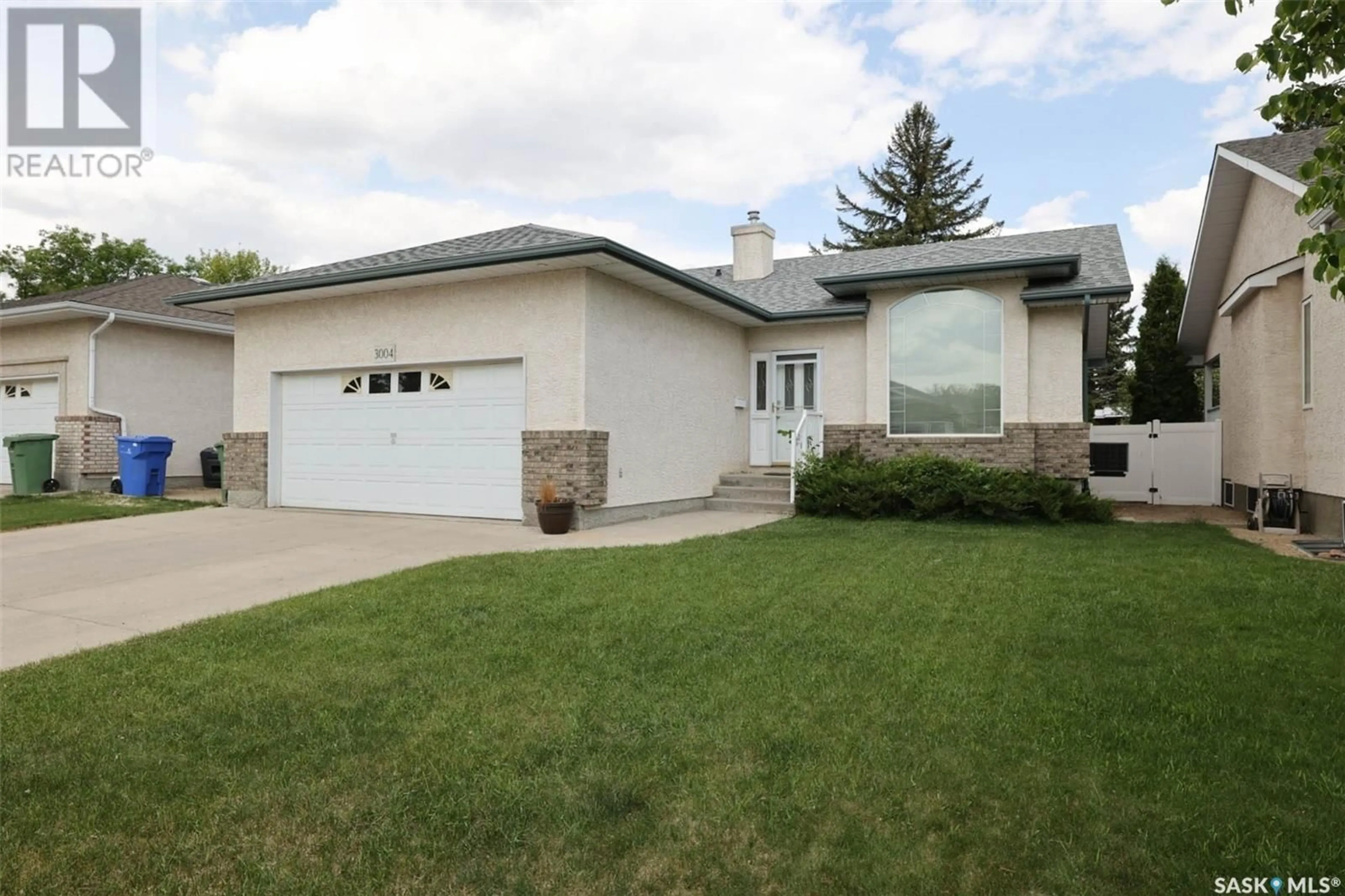 Home with vinyl exterior material, street for 3004 BIRCH CRESCENT, Regina Saskatchewan S4S7J3