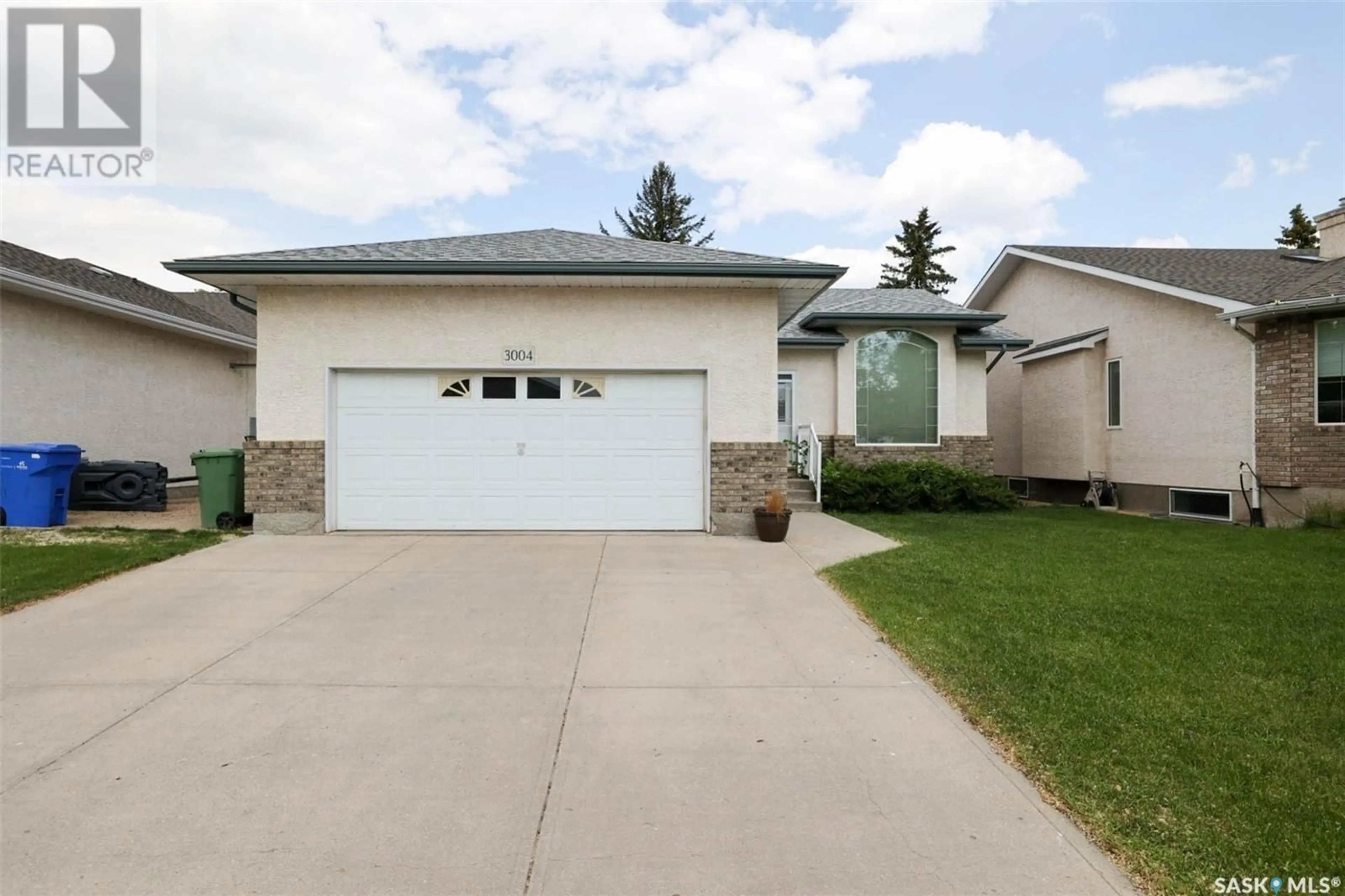 Home with vinyl exterior material, street for 3004 BIRCH CRESCENT, Regina Saskatchewan S4S7J3