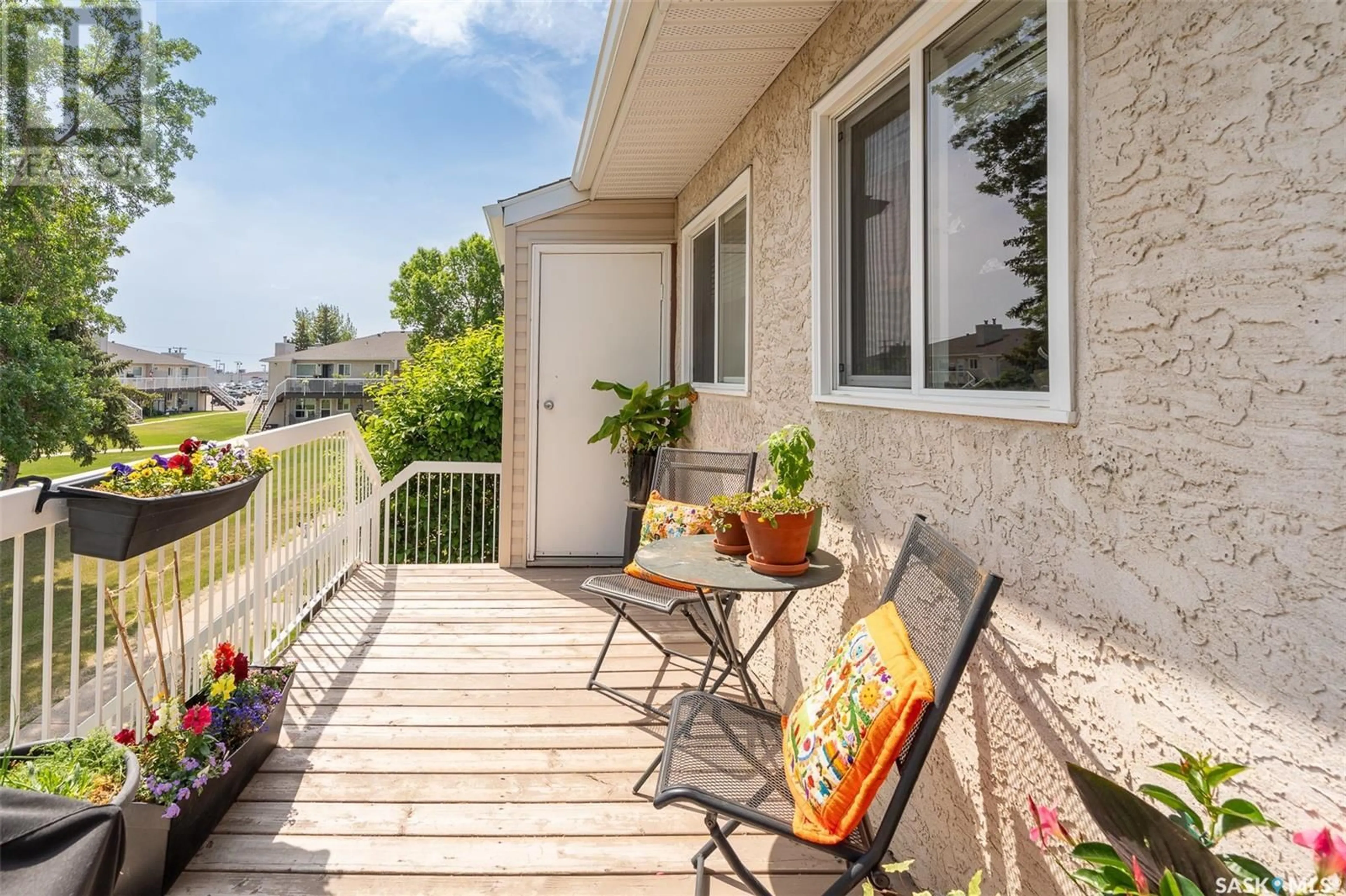 Patio, street for 67 - 312 WOOD LILY DRIVE, Moose Jaw Saskatchewan S6J1G6