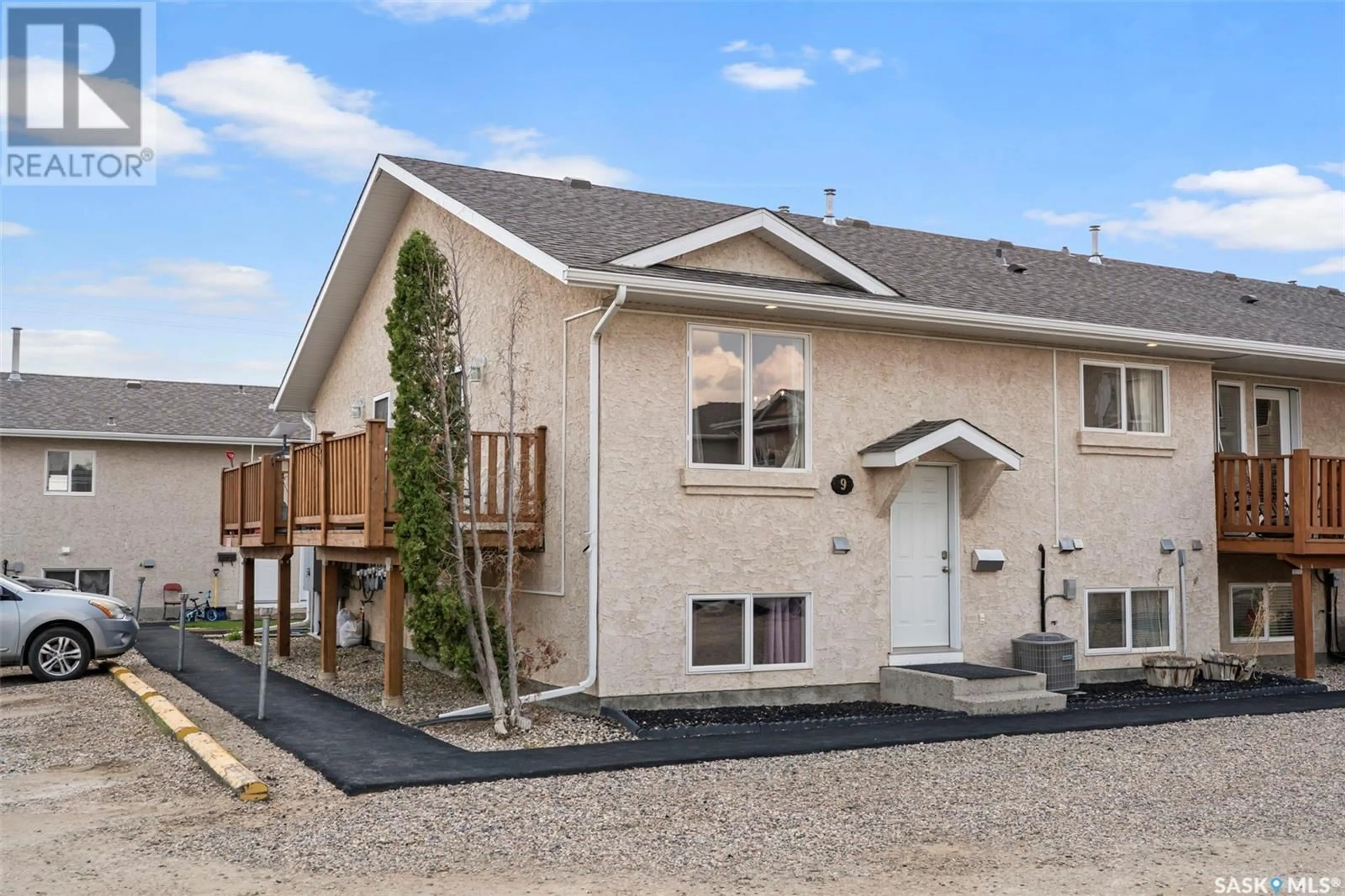 Home with vinyl exterior material, street for 9 231 MAIN STREET, Martensville Saskatchewan S0K2T0