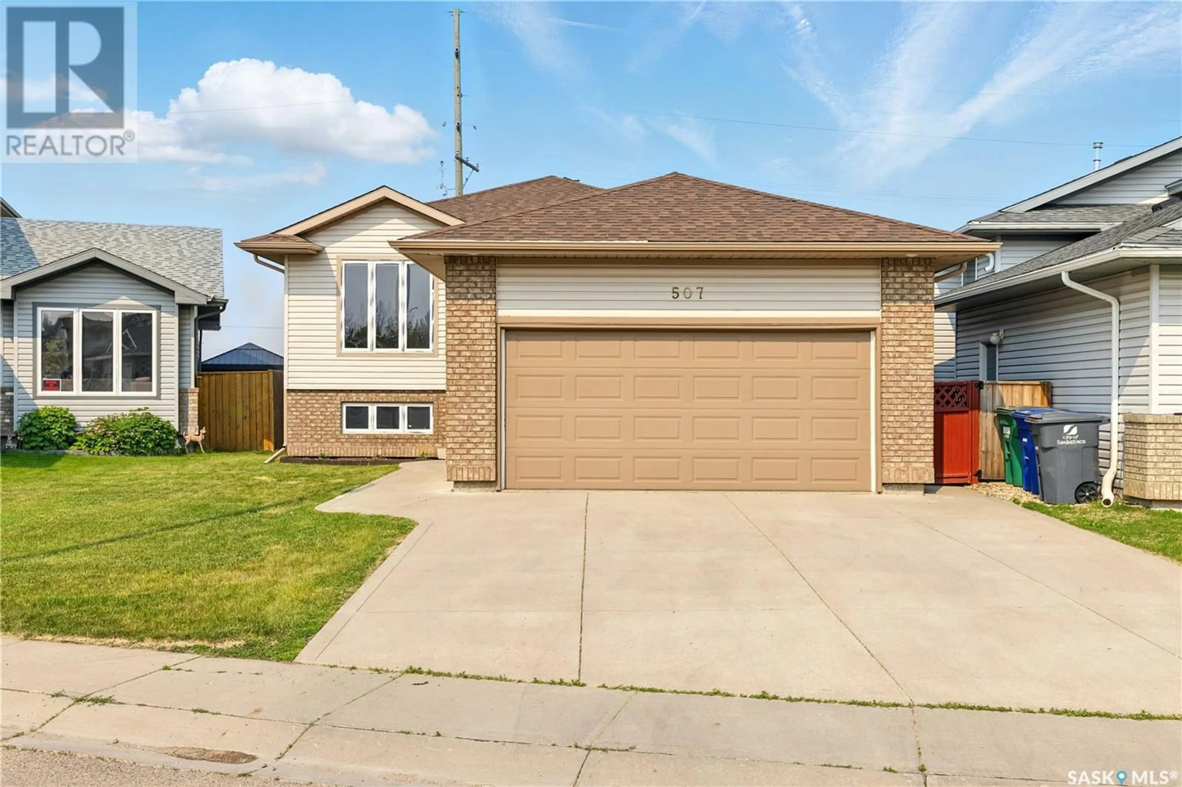Home with brick exterior material, street for 507 BUCKWOLD COVE, Saskatoon Saskatchewan S7N4W1