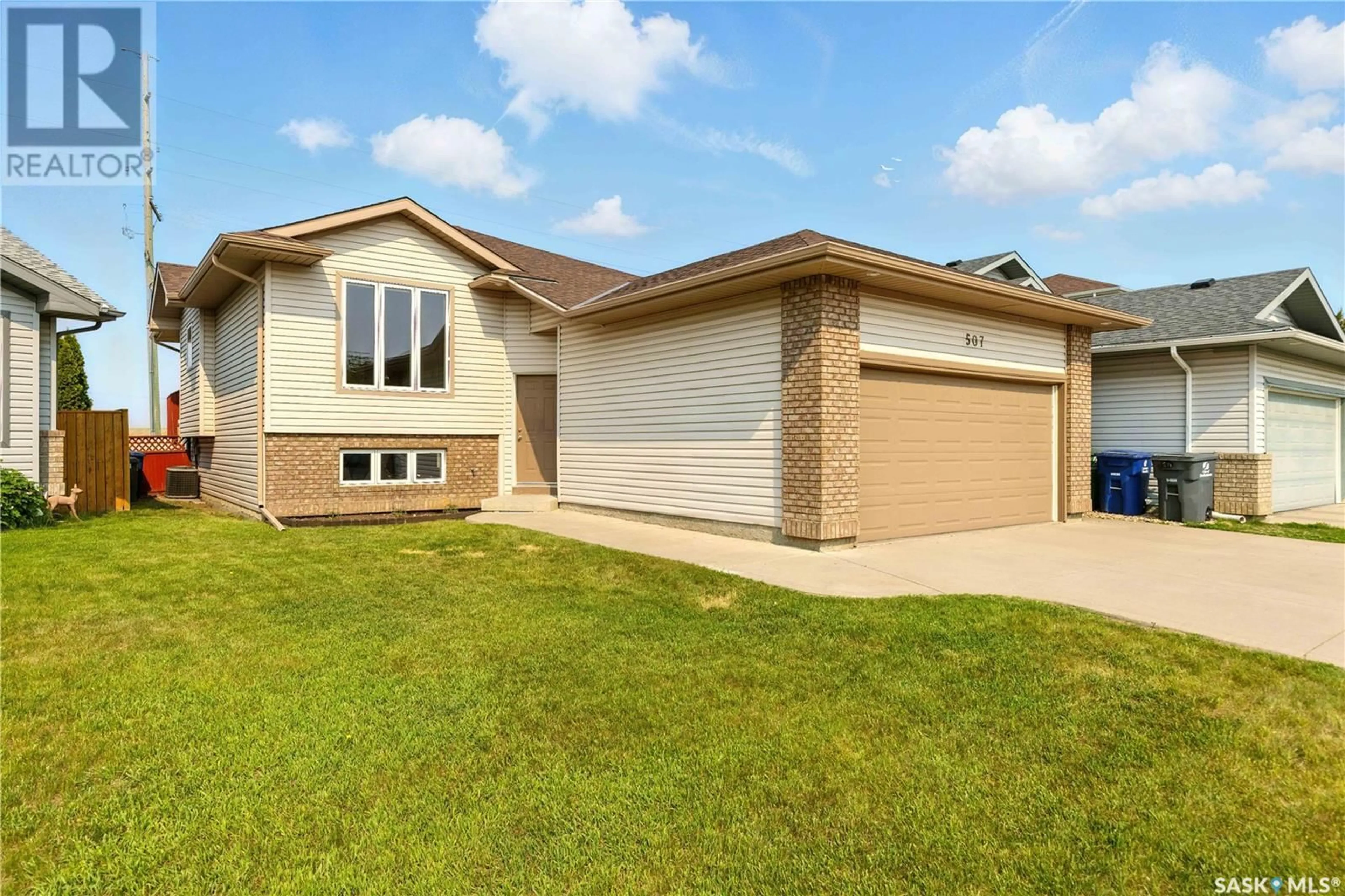 Home with brick exterior material, street for 507 BUCKWOLD COVE, Saskatoon Saskatchewan S7N4W1