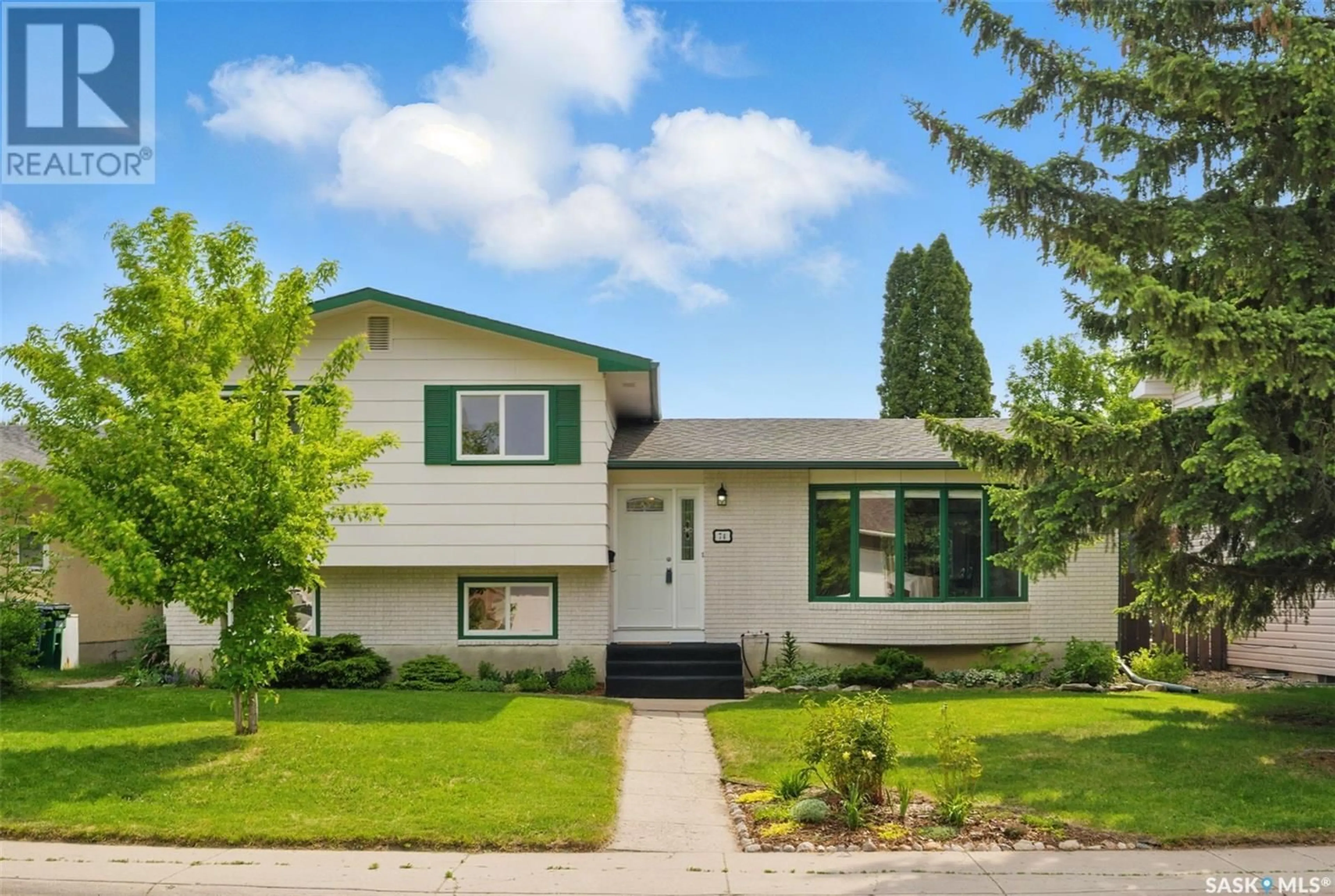 Home with vinyl exterior material, street for 74 DEGEER CRESCENT, Saskatoon Saskatchewan S7H4P7