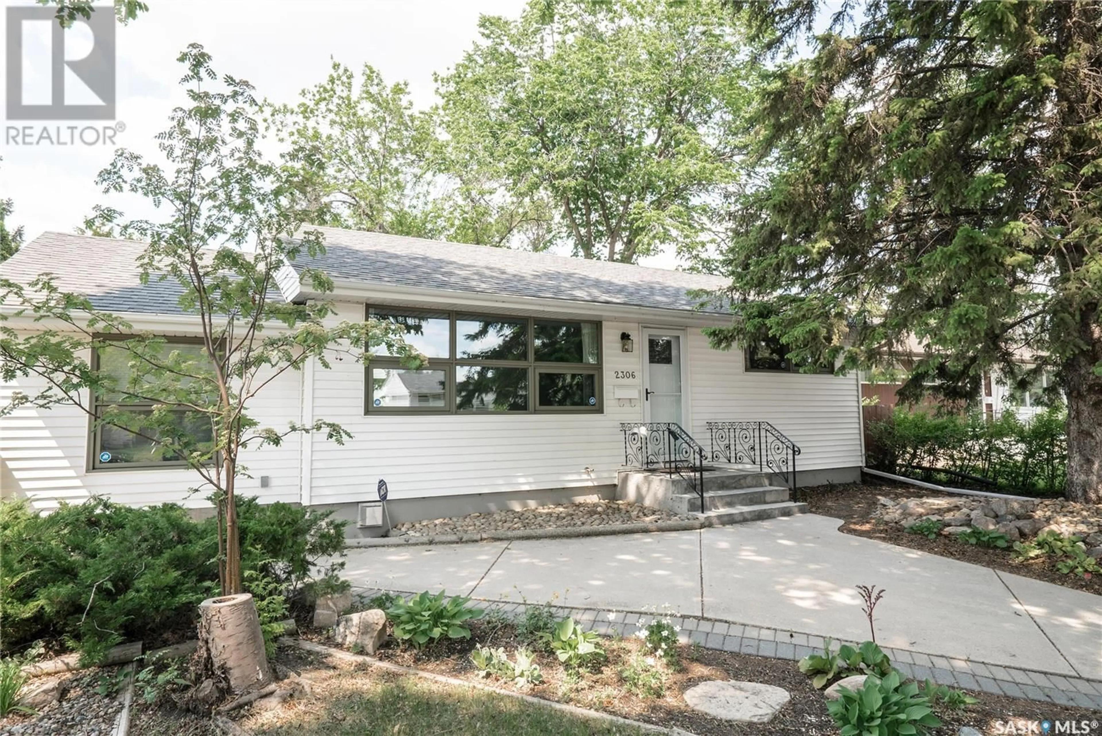 Home with vinyl exterior material, street for 2306 HANOVER AVENUE, Saskatoon Saskatchewan S7J1E6