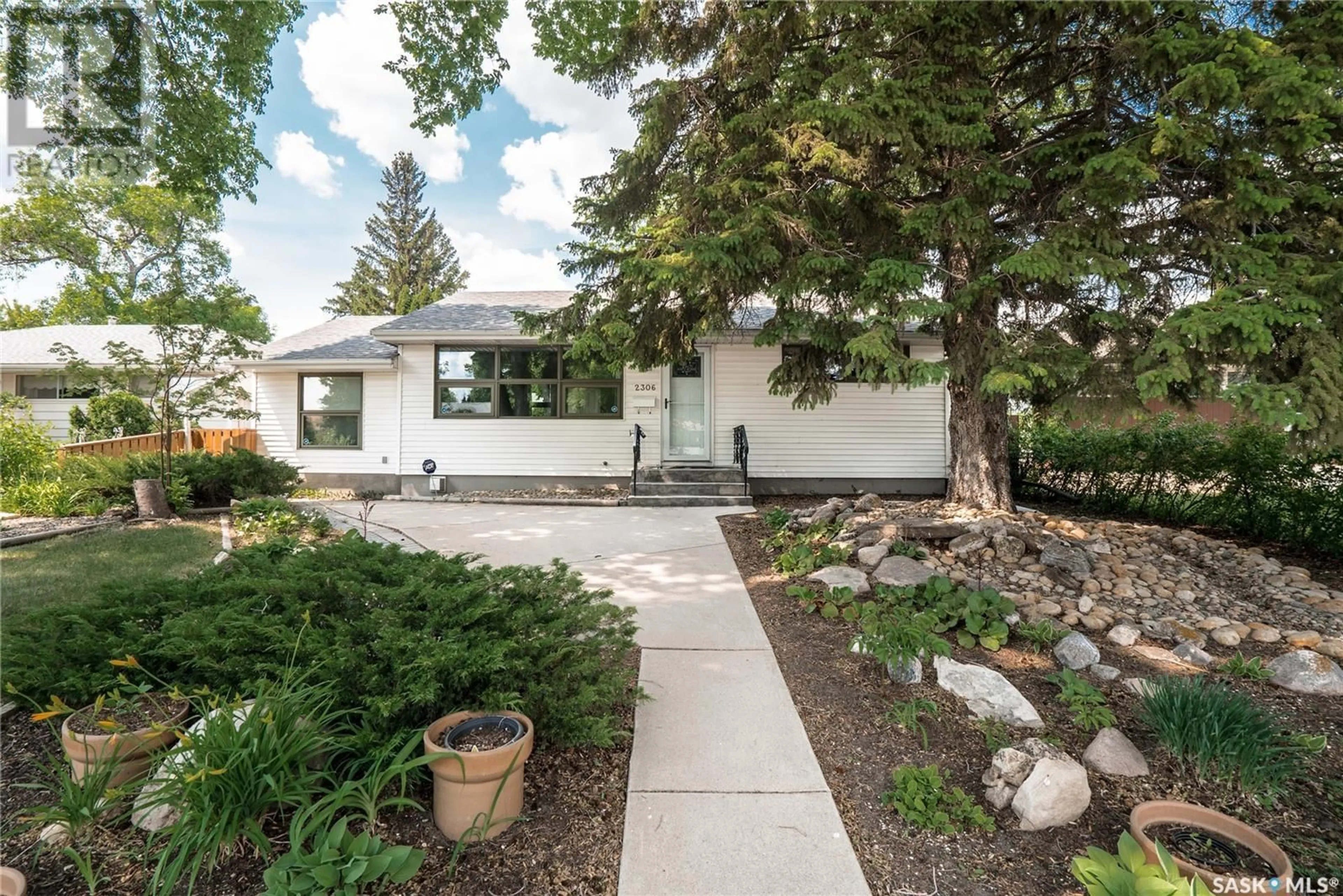 Home with vinyl exterior material, street for 2306 HANOVER AVENUE, Saskatoon Saskatchewan S7J1E6