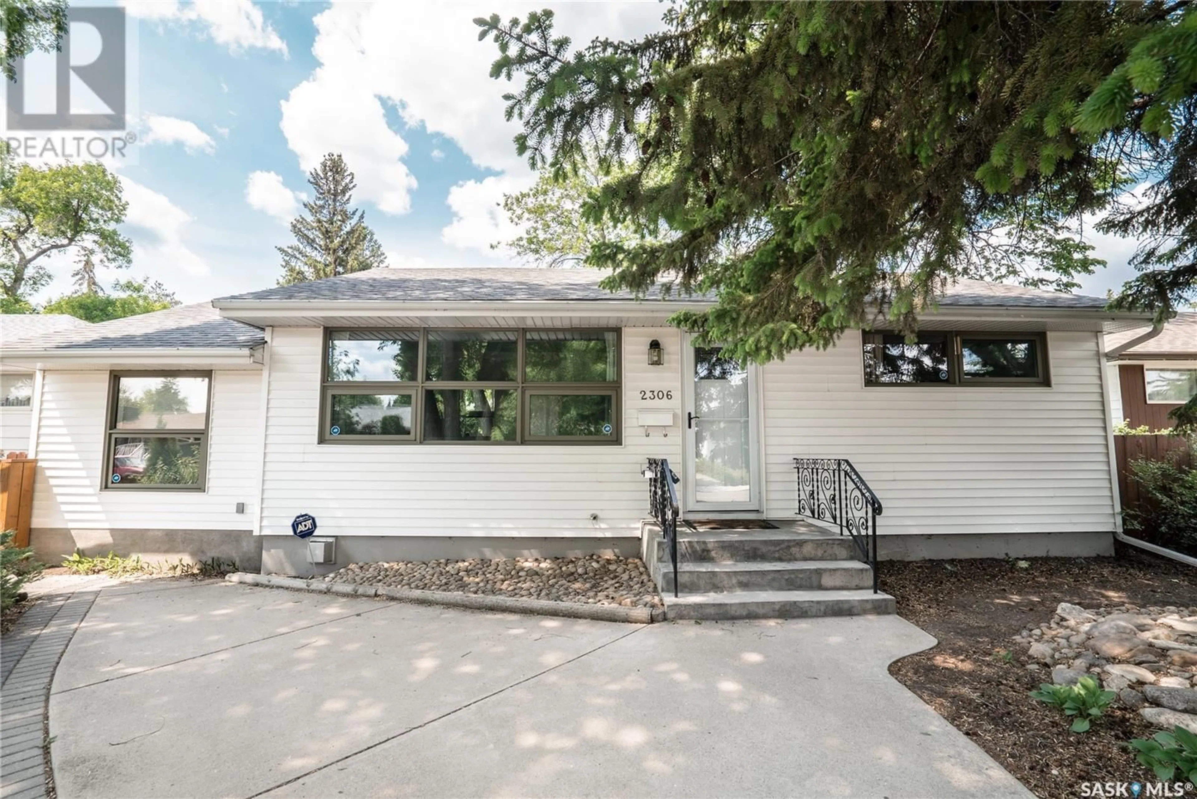 Home with vinyl exterior material, street for 2306 HANOVER AVENUE, Saskatoon Saskatchewan S7J1E6