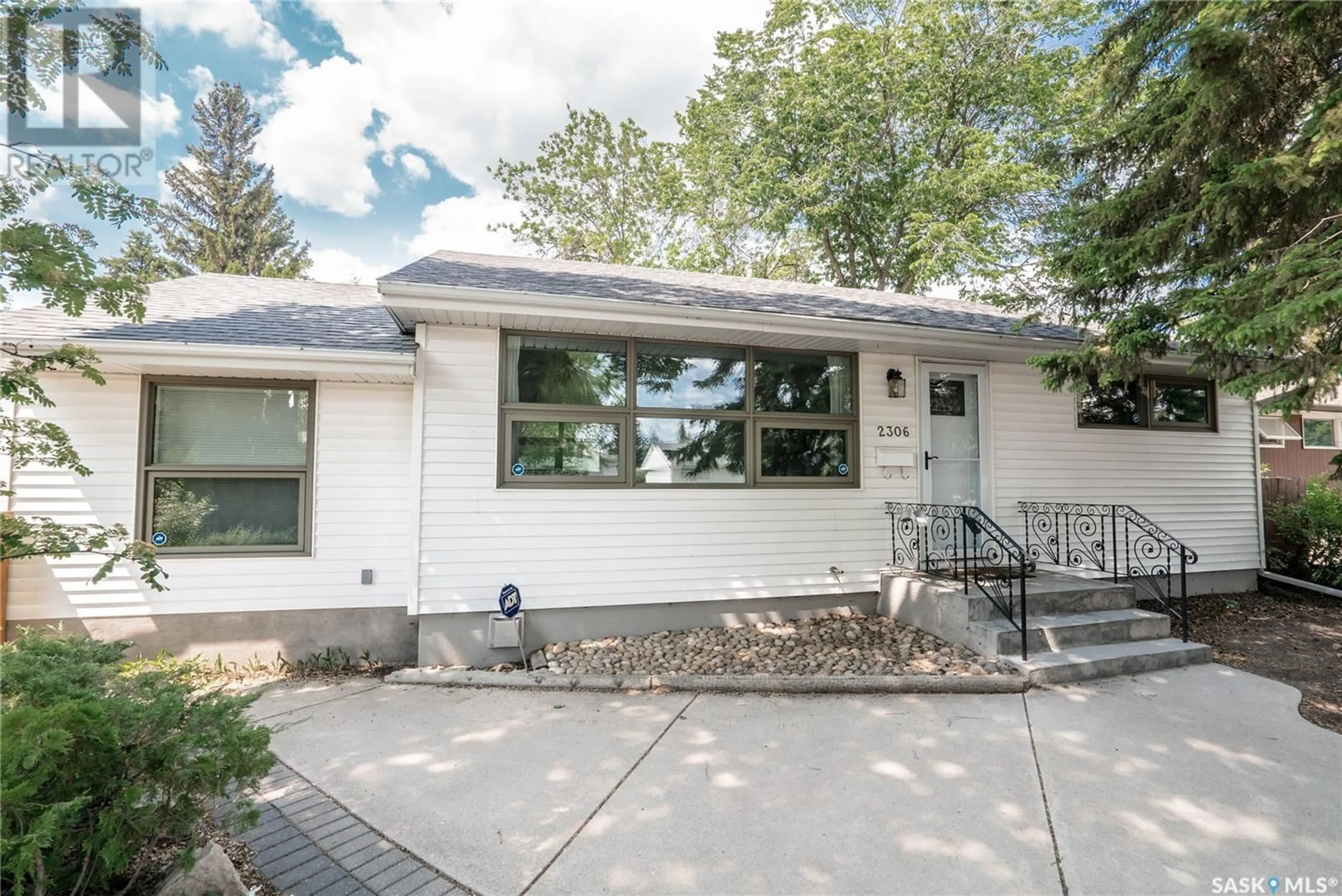 Home with vinyl exterior material, street for 2306 HANOVER AVENUE, Saskatoon Saskatchewan S7J1E6