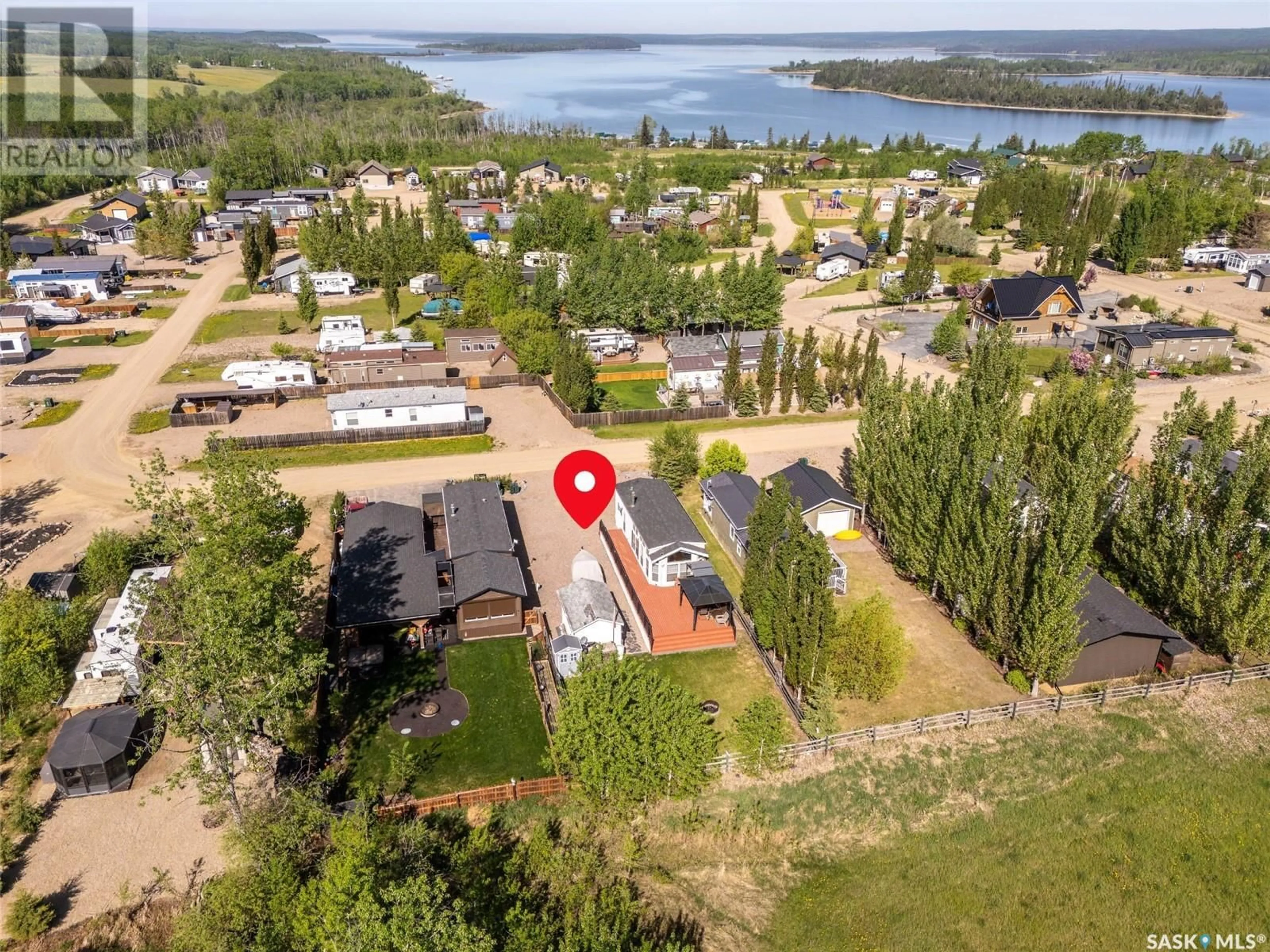 A pic from outside/outdoor area/front of a property/back of a property/a pic from drone, water/lake/river/ocean view for 1219 OAK AVENUE, Beaver River Rm No. 622 Saskatchewan S0M1A0