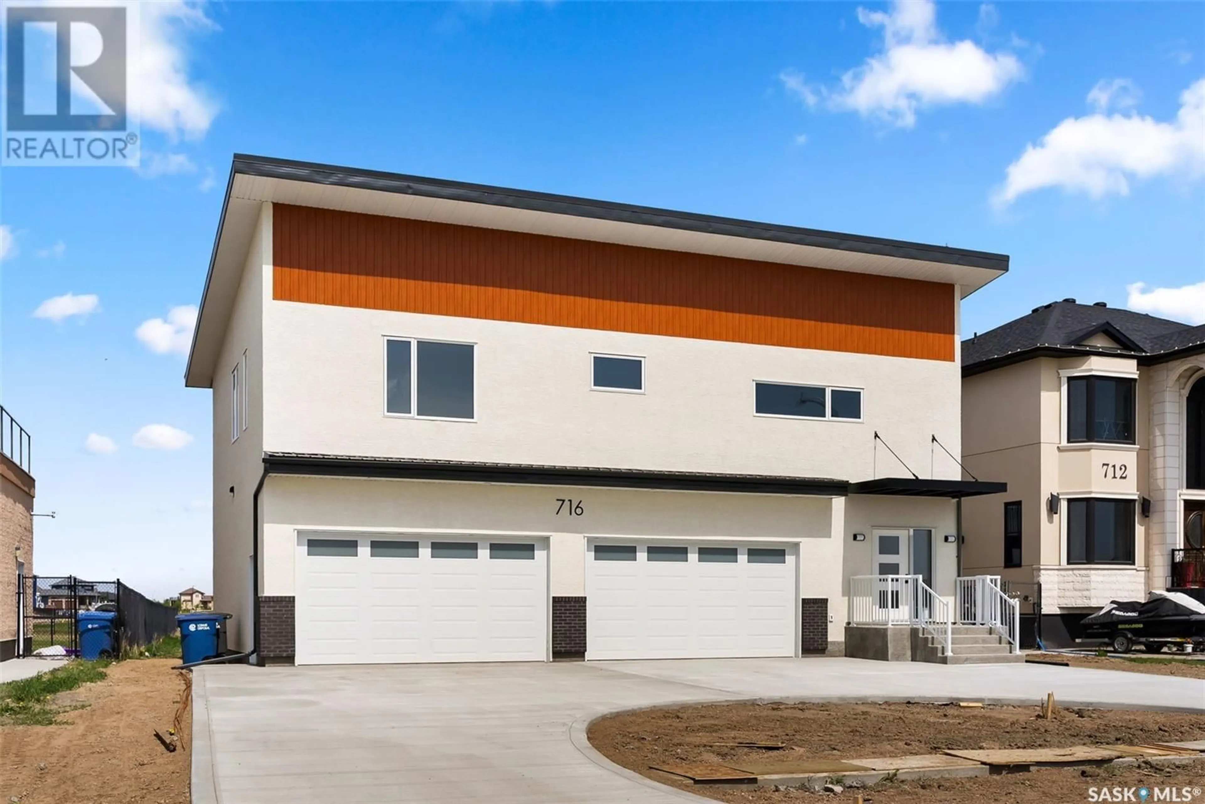 Home with vinyl exterior material, street for 716 EMERALD PARK ROAD, Edenwold Rm No. 158 Saskatchewan S4L0C4