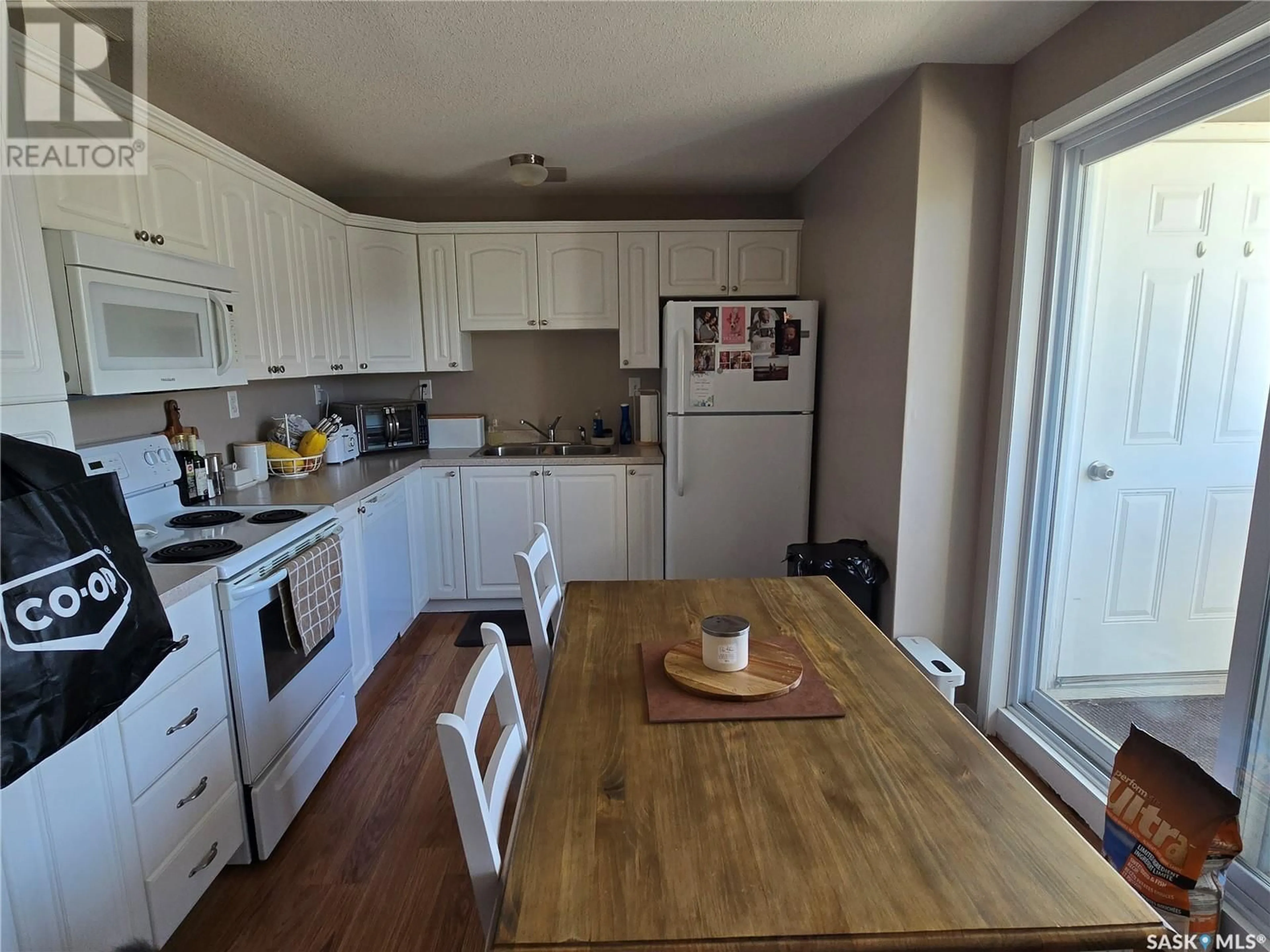 Standard kitchen, wood/laminate floor for 26 - 485 1ST AVENUE NW, Weyburn Saskatchewan S4H1T1