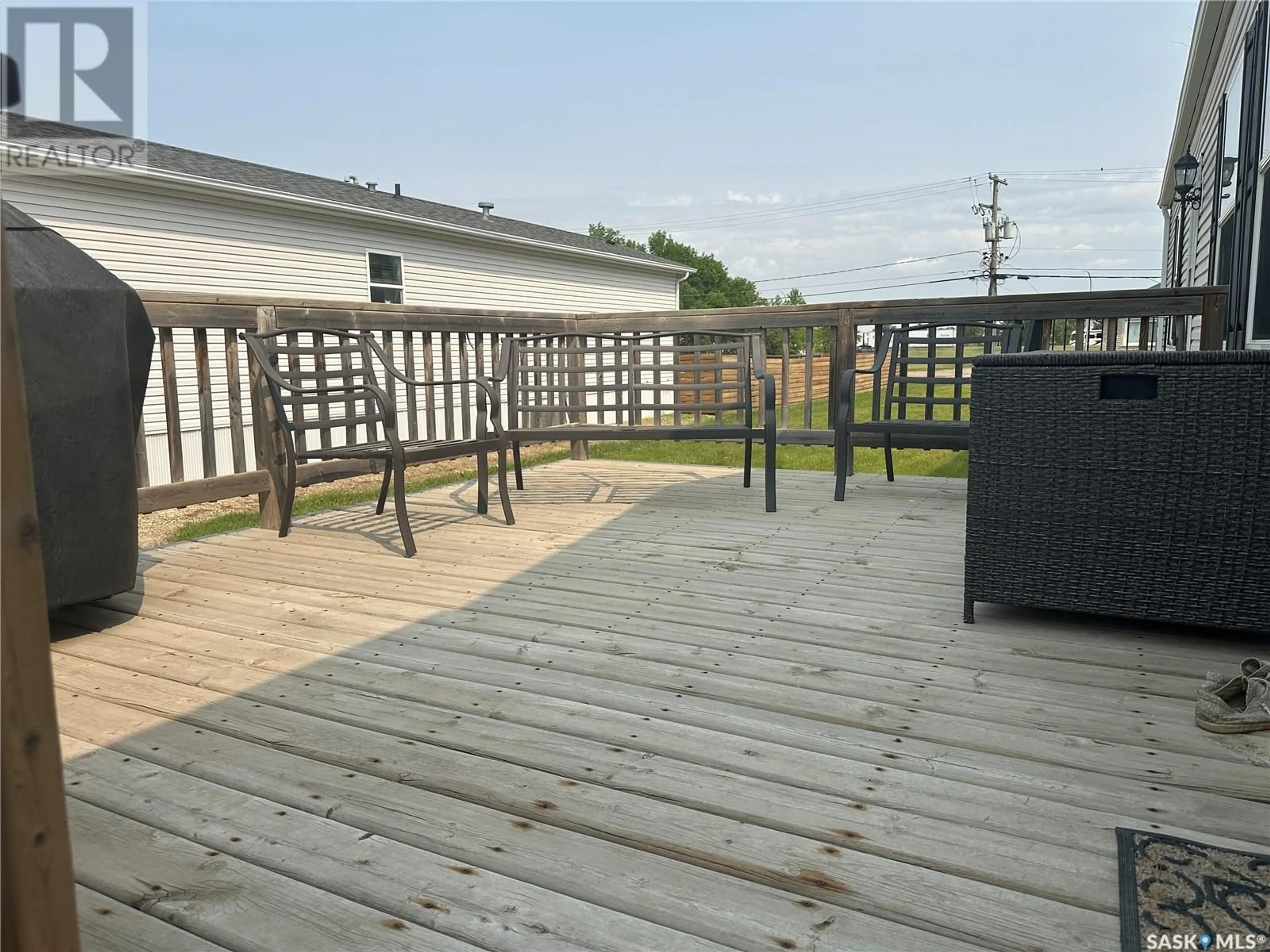 Patio, water/lake/river/ocean view for 109 1ST AVENUE, Weyburn Saskatchewan S4H2H9
