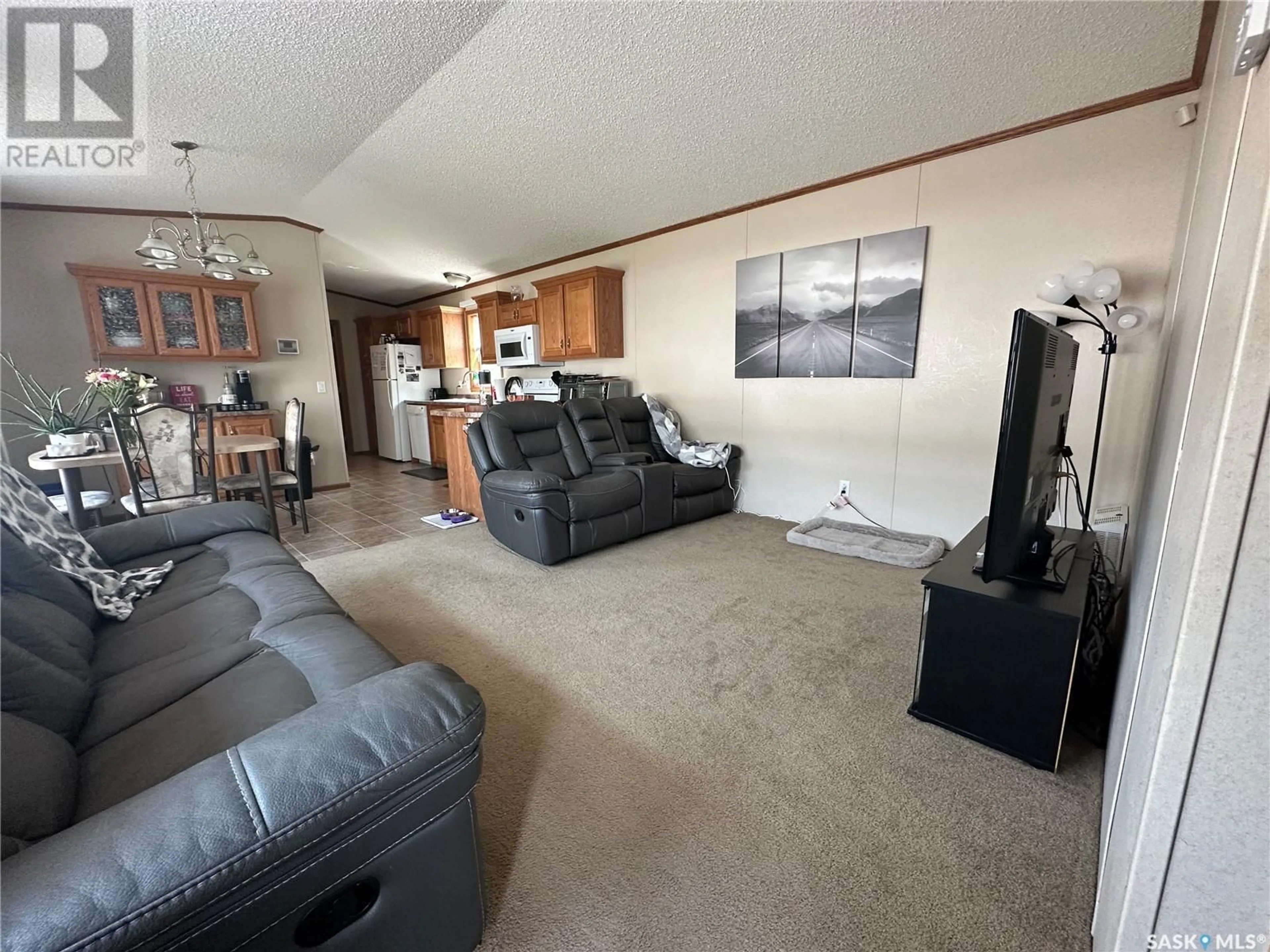 Living room with furniture, unknown for 109 1ST AVENUE, Weyburn Saskatchewan S4H2H9