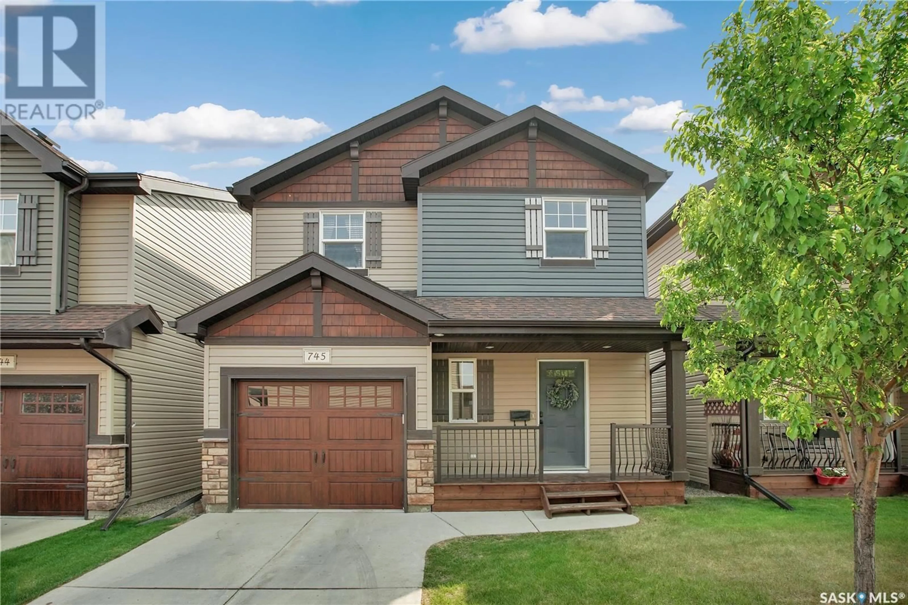 Home with vinyl exterior material, street for 150 - 745 LANGLOIS WAY, Saskatoon Saskatchewan S7T0L4