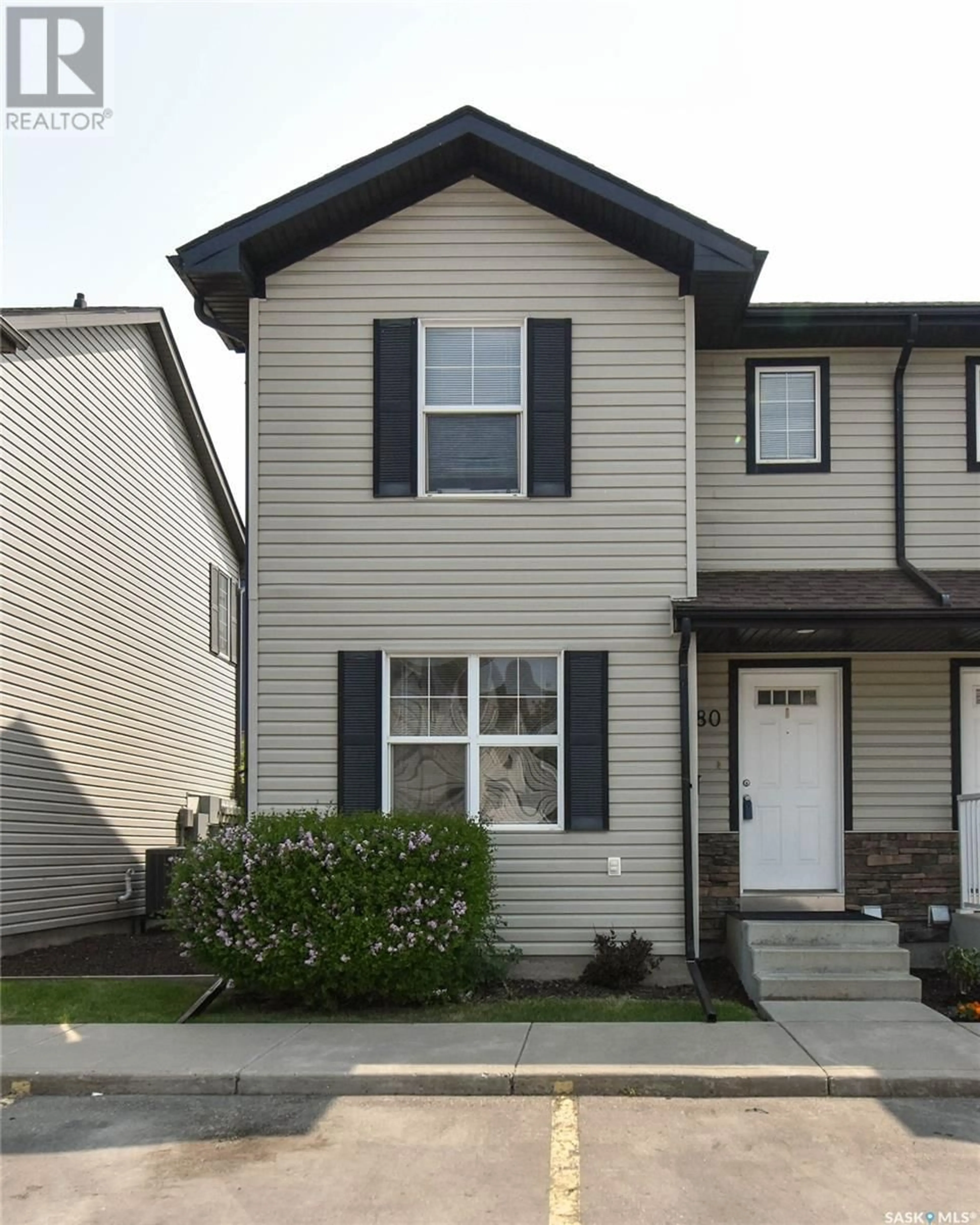 Home with vinyl exterior material, street for 80 135 PAWLYCHENKO LANE, Saskatoon Saskatchewan S7V1J8
