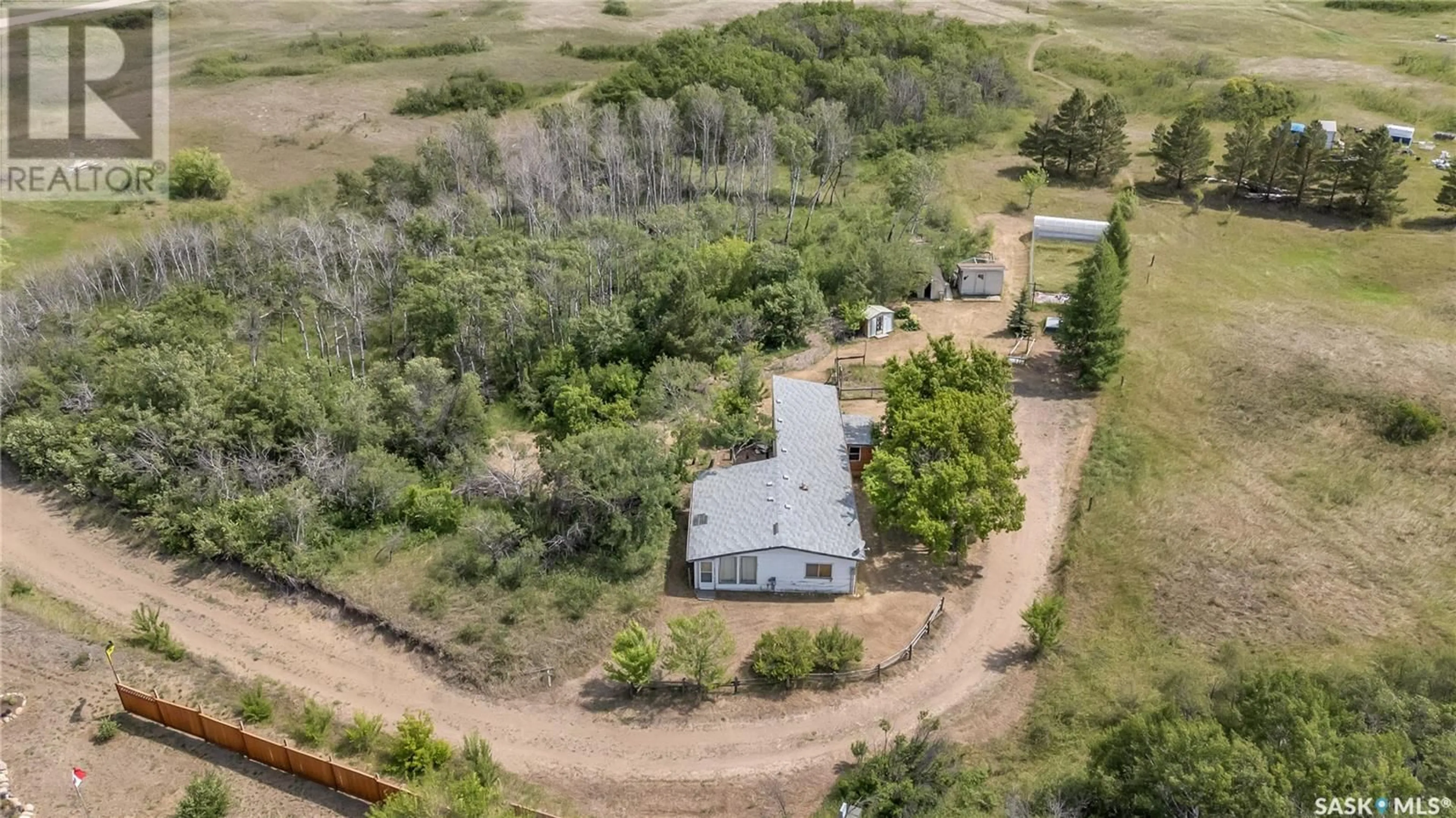 A pic from outside/outdoor area/front of a property/back of a property/a pic from drone, unknown for PIKE LAKE ACREAGE, Vanscoy Rm No. 345 Saskatchewan S0L3J0