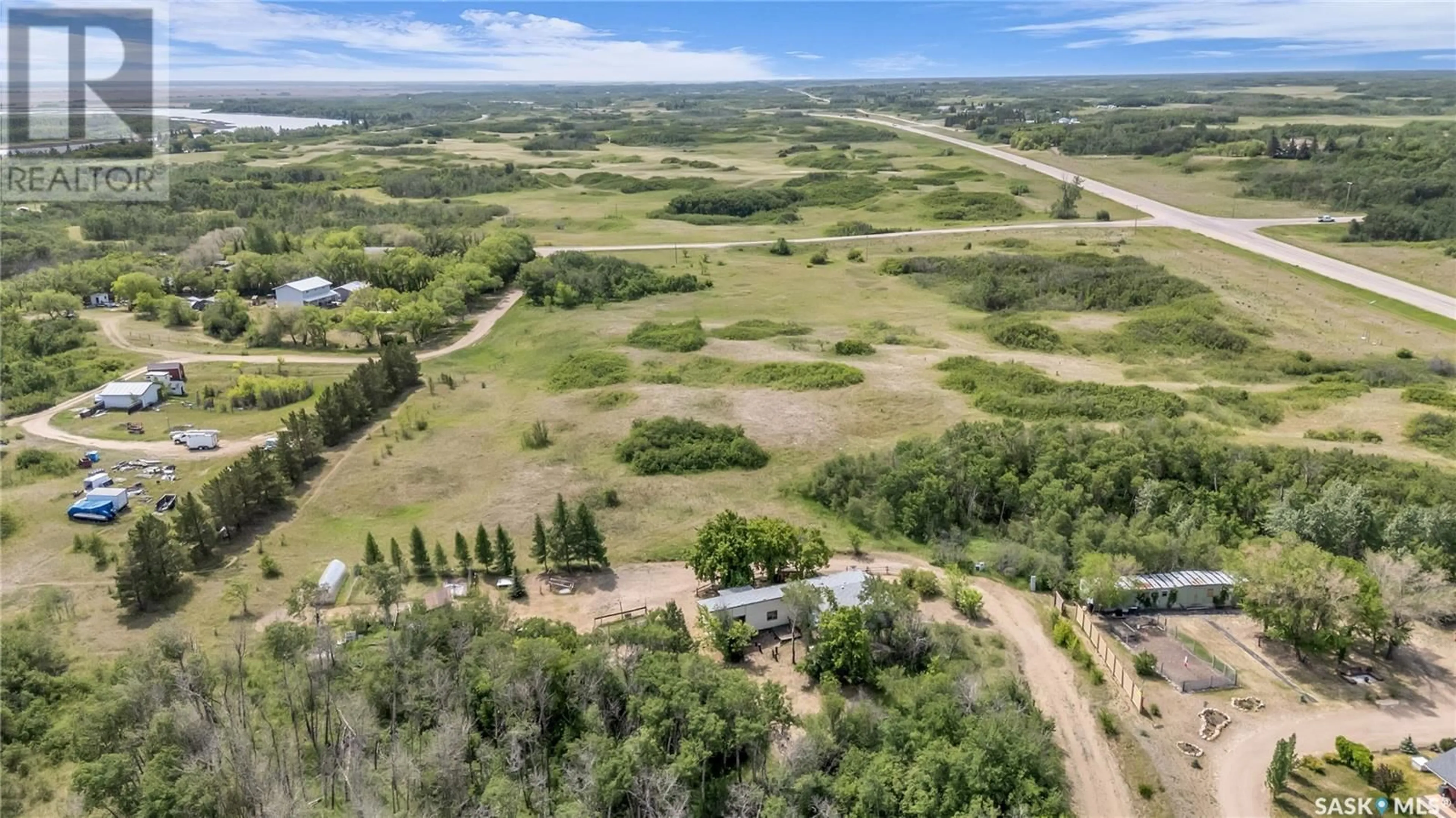 A pic from outside/outdoor area/front of a property/back of a property/a pic from drone, unknown for PIKE LAKE ACREAGE, Vanscoy Rm No. 345 Saskatchewan S0L3J0