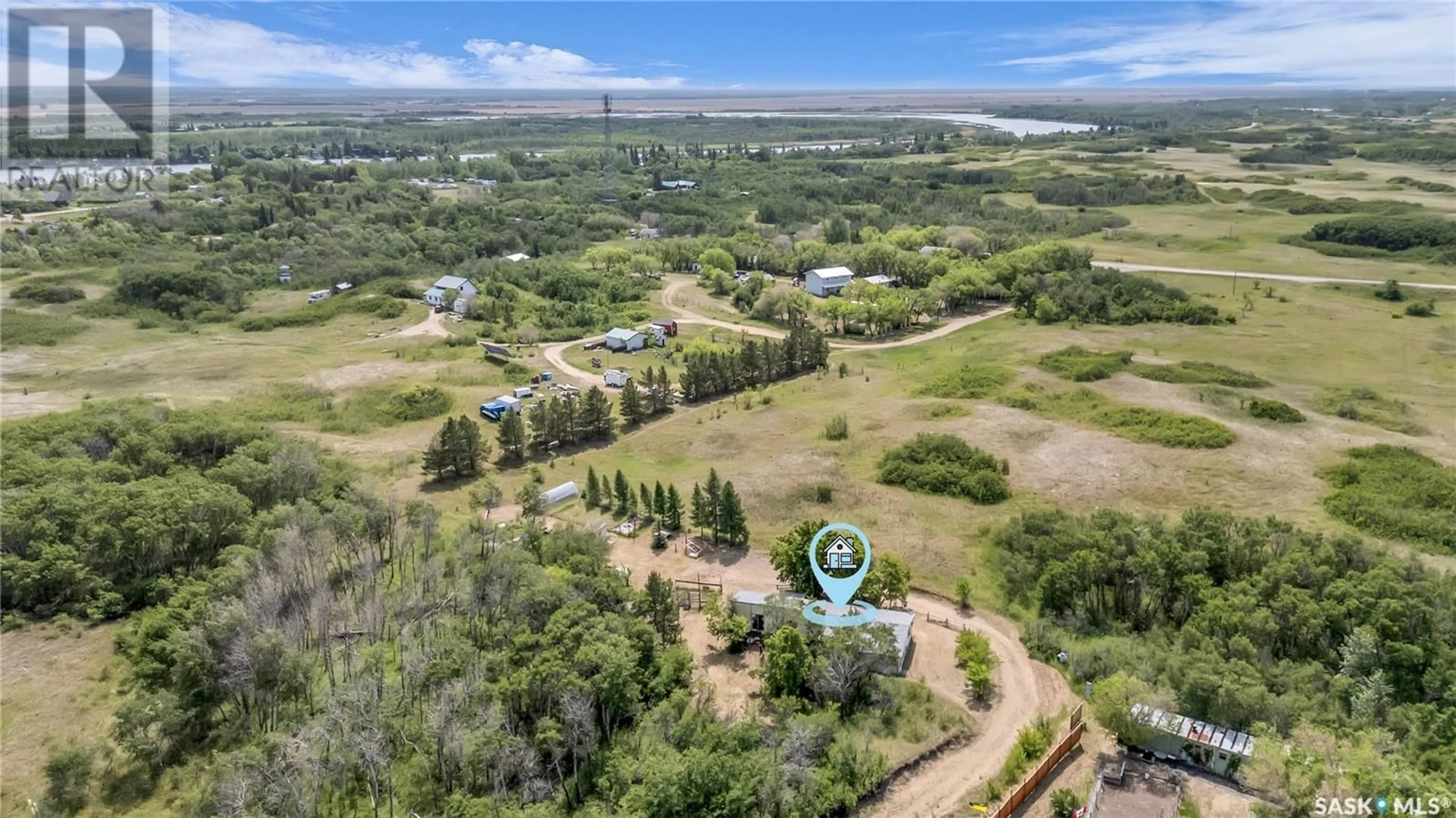 A pic from outside/outdoor area/front of a property/back of a property/a pic from drone, unknown for PIKE LAKE ACREAGE, Vanscoy Rm No. 345 Saskatchewan S0L3J0