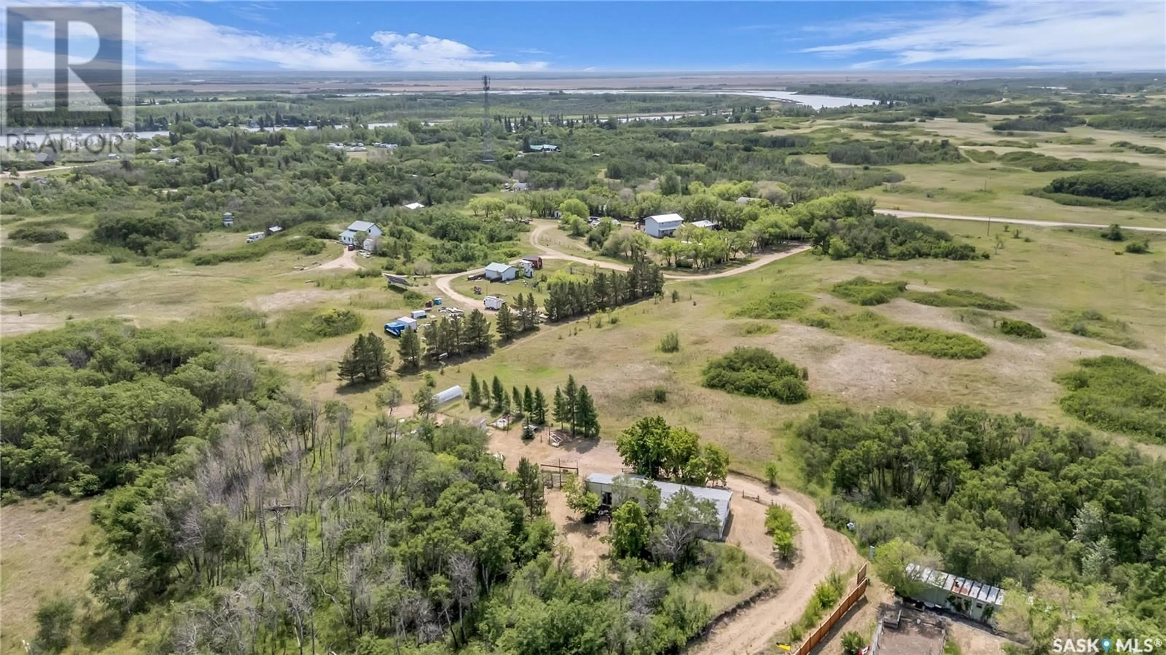 A pic from outside/outdoor area/front of a property/back of a property/a pic from drone, unknown for PIKE LAKE ACREAGE, Vanscoy Rm No. 345 Saskatchewan S0L3J0