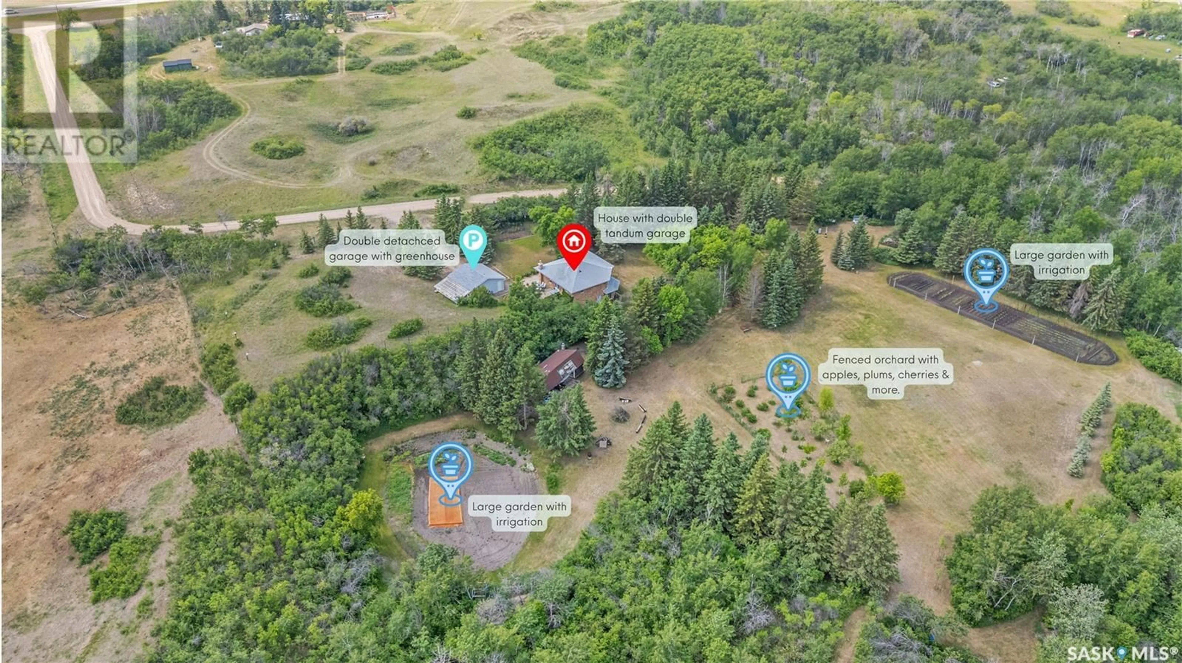 A pic from outside/outdoor area/front of a property/back of a property/a pic from drone, forest/trees view for STUGLIN ACREAGE, Vanscoy Rm No. 345 Saskatchewan S7K1N2