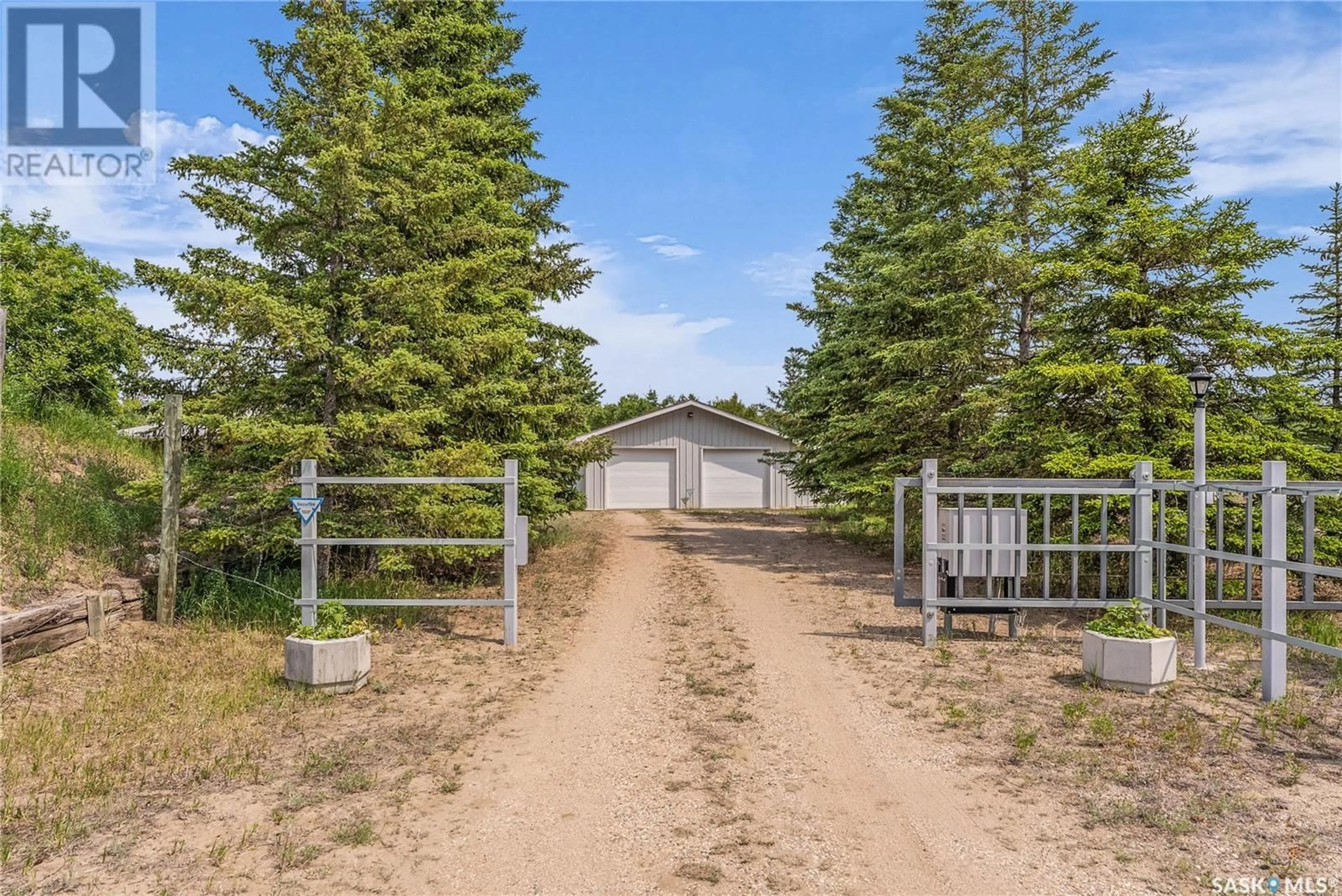 A pic from outside/outdoor area/front of a property/back of a property/a pic from drone, unknown for STUGLIN ACREAGE, Vanscoy Rm No. 345 Saskatchewan S7K1N2