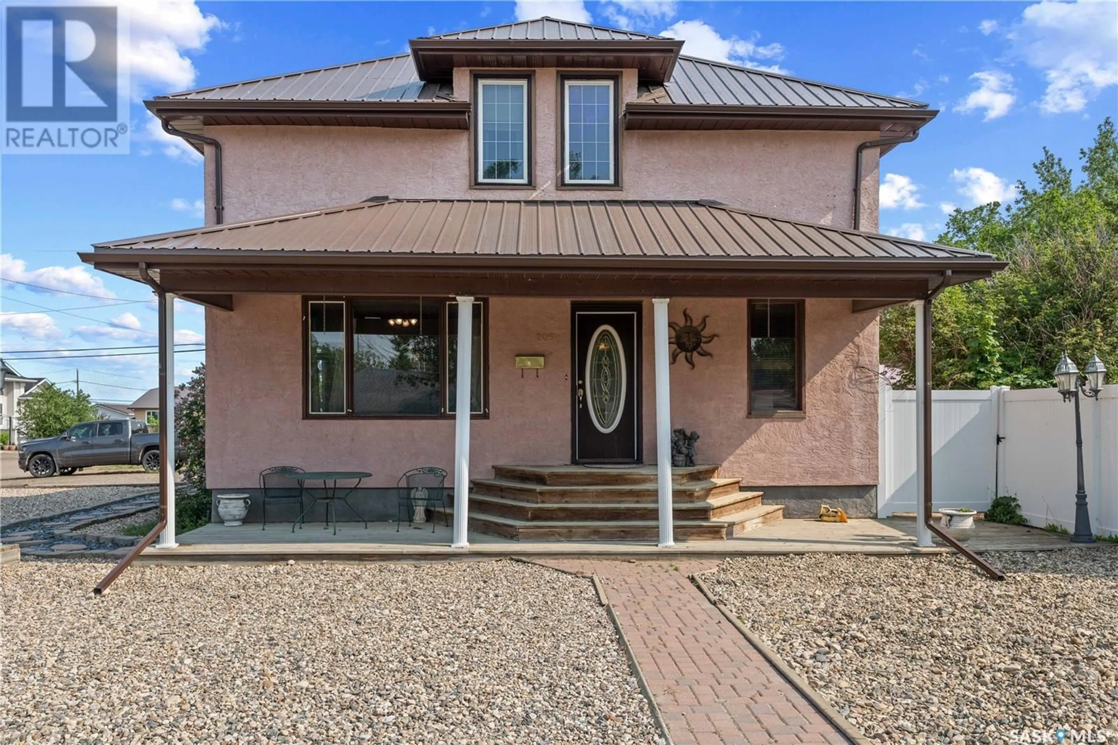 Home with brick exterior material, street for 205 5TH AVENUE, Gravelbourg Saskatchewan S0H1X0