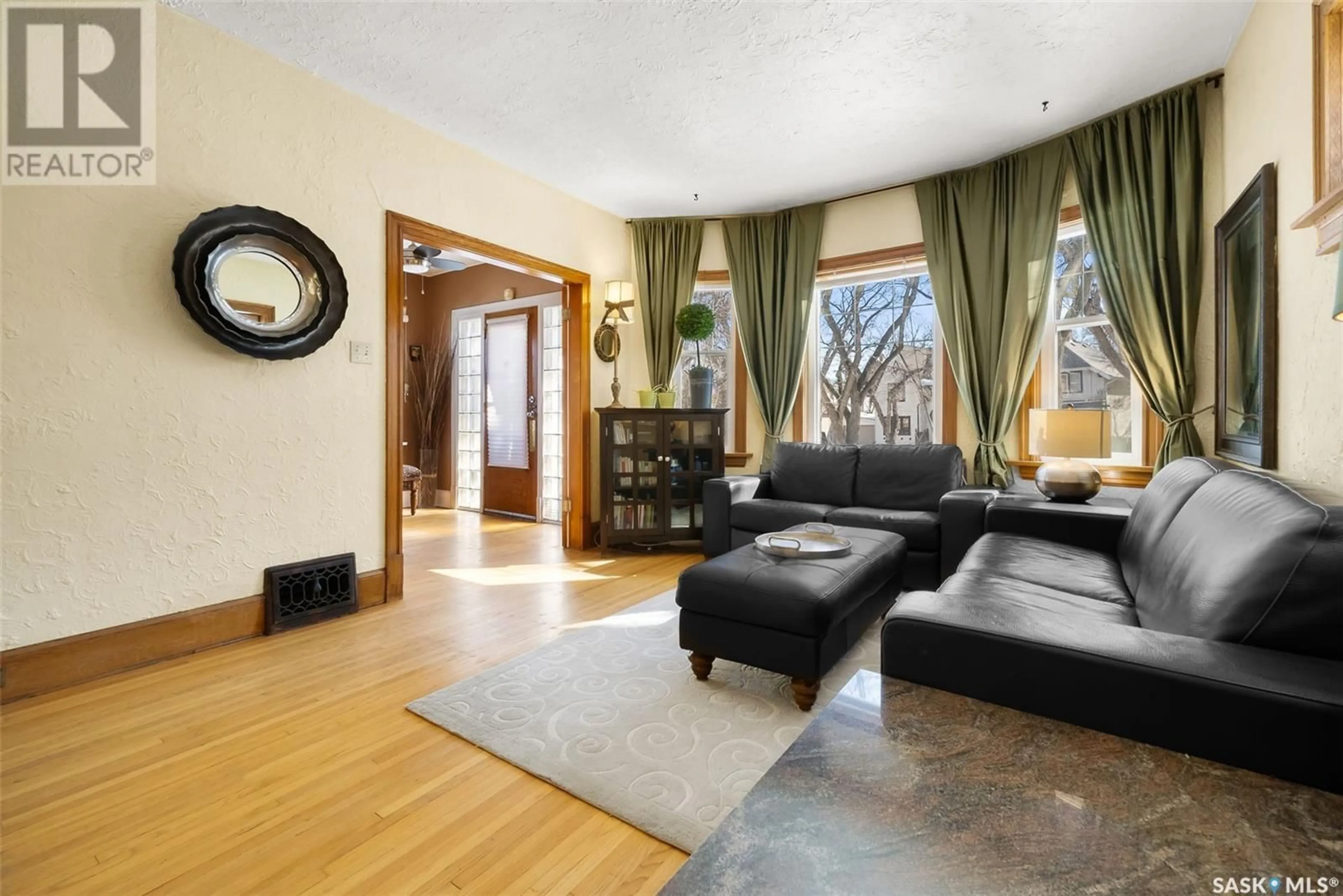 Living room with furniture, unknown for 115 CONNAUGHT CRESCENT, Regina Saskatchewan S4T6M8