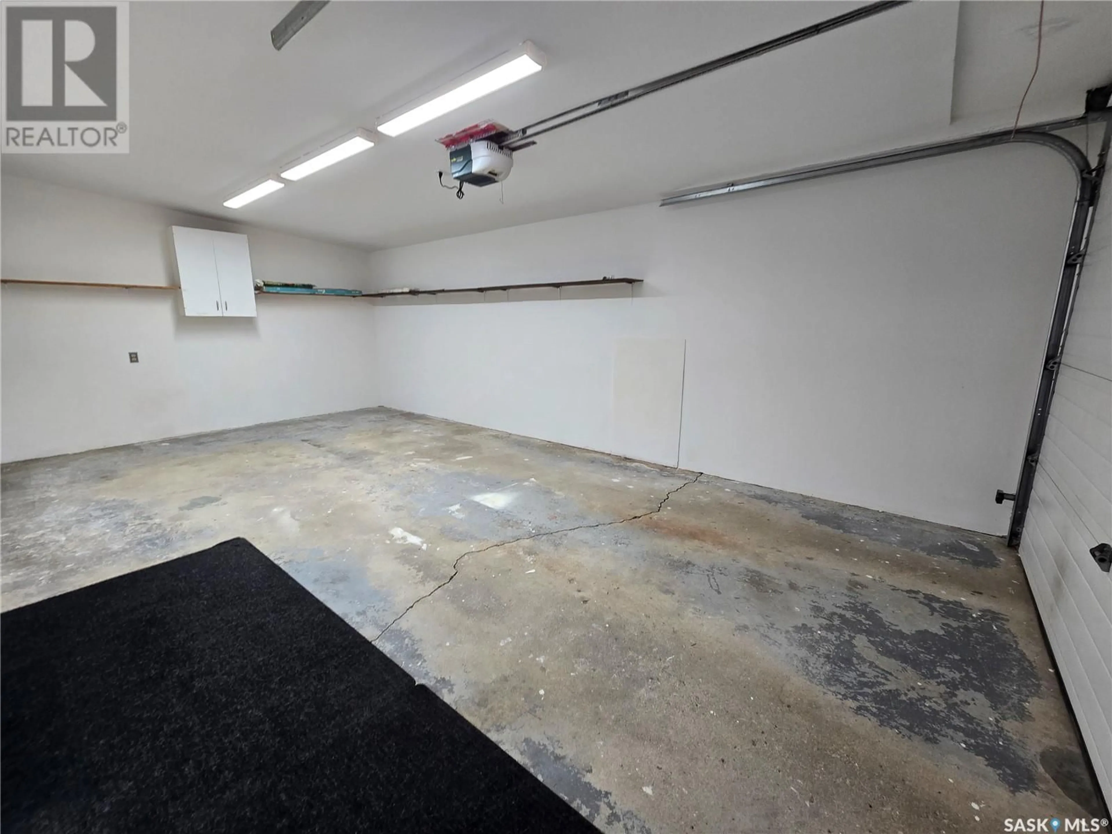 Indoor garage for 612 3RD STREET, Weyburn Saskatchewan S4H2E1
